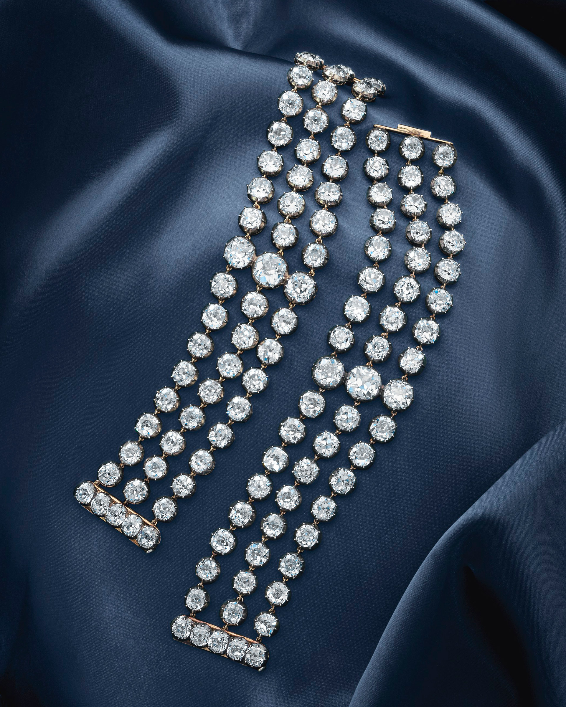 The historic Marie-Antoinette diamonds a stunning pair of diamond bracelets. Old-cut diamonds, silver and yellow gold, commissioned circa 1776, adapted in the 19th century, fitted blue velvet case. Size/dimensions: 18.7 cm each. Sold for CHF7,459,000 on 9 November 2021 at Christie’s in Geneva