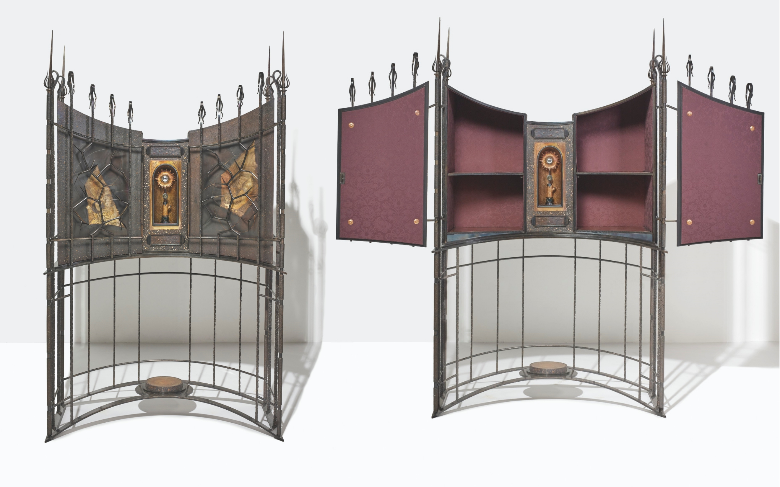 André Dubreuil, Cabinet, single piece, 1992. Patinated steel, partly enamelled and patinated copper, marble, rock crystal, convex mirror, painted metal and fabric. Measurements: 88⅝ x 52⅜ x 23⅝  in (225 x 133 x 60 cm). Estimate: €70,000-90,000. Offered in Design on 1 December 2021 at Christie’s in Paris