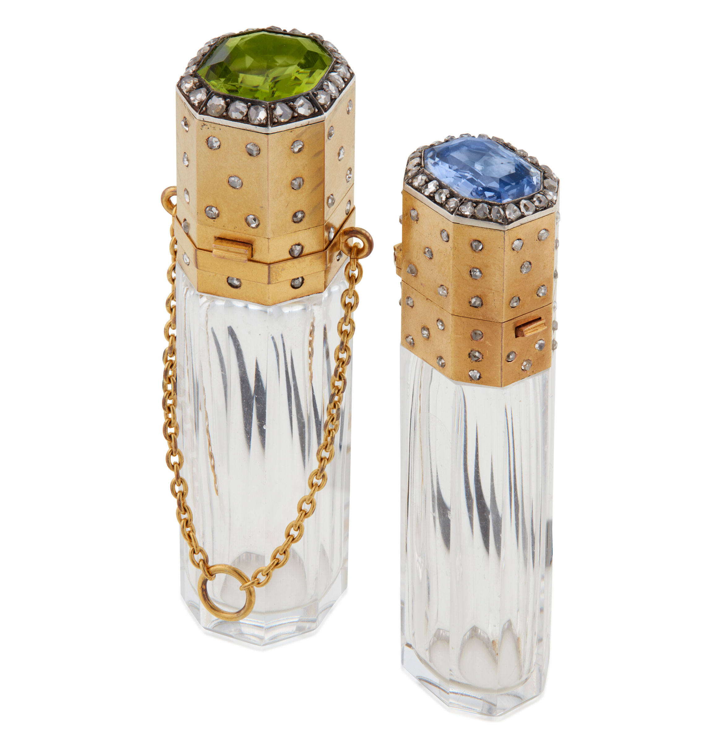 No reserve | two antique sapphire, peridot and diamond scent bottles. Size/dimensions: sapphire scent bottle 2⅝ x¾ x½ in (6.7 x 1.9 x 1.3 cm); peridot scent bottle 2⅞ x¾ x⅝ in (2.2 x 1.9 x 1.5 cm). Estimate: $5,000-7,000. Offered in Jewels Online on 24 January-9 February 2022 at Christie’s Online