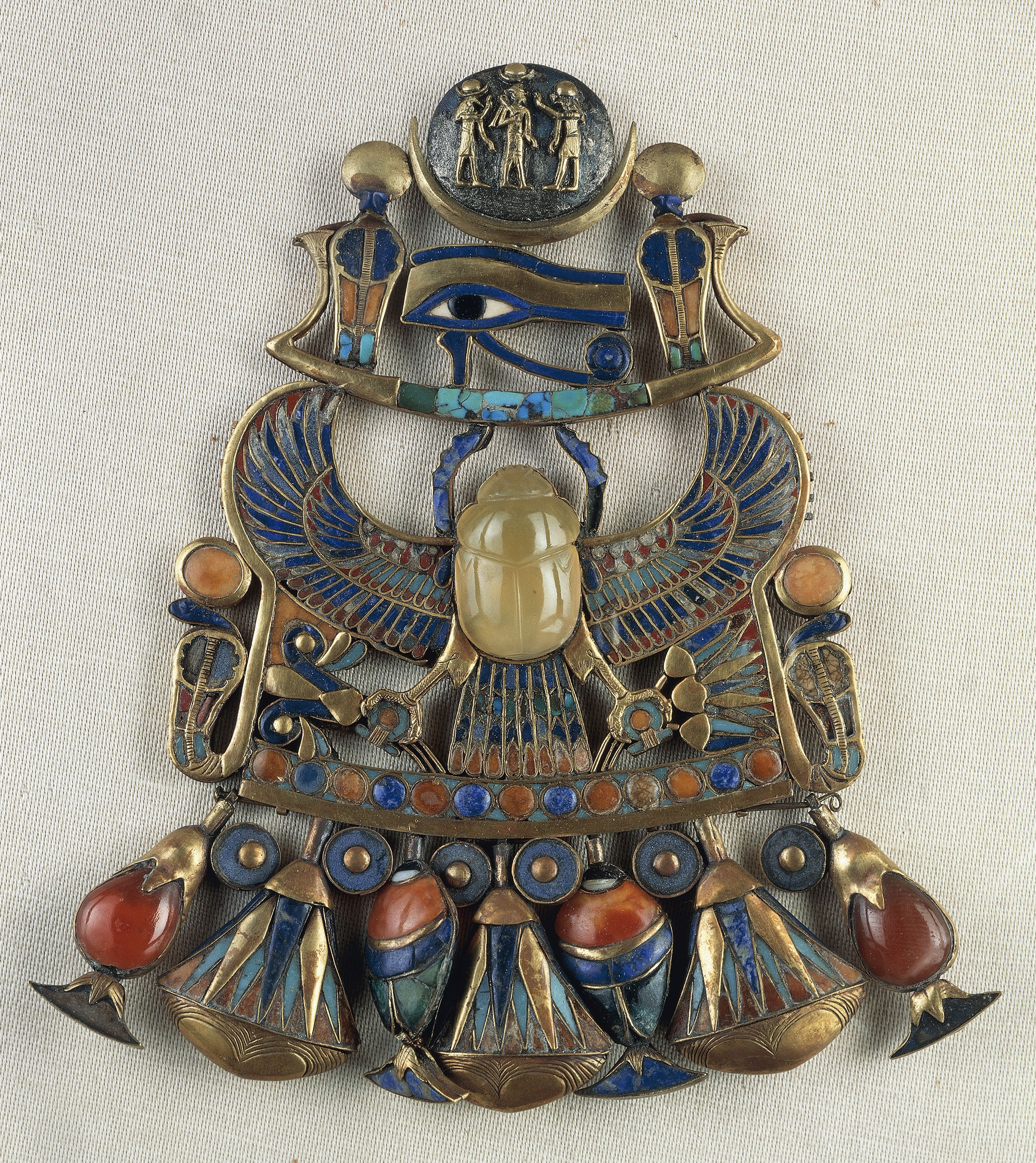 Pectoral from the tomb of King Tutankhamun, with a scarab carved from Libyan desert glass, in the Egyptian Museum, Cairo. Photo by DeAgostini/Getty Images