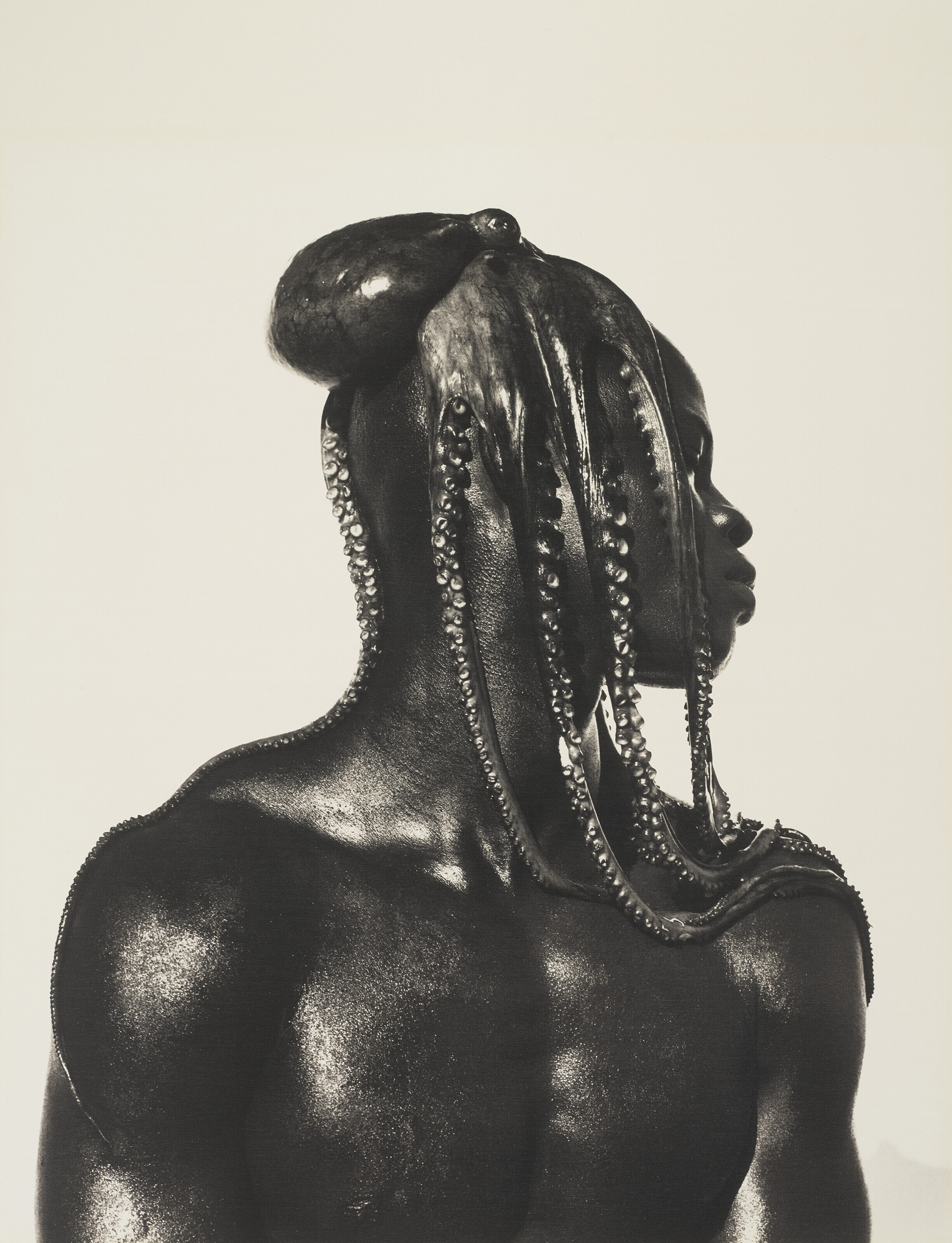 Herb Ritts (1952-2002), Djimon with Octopus, 1989. Gelatin silver print on linen, mounted on board. Image: 28 x 23¼ in (71.1 x 58.4 cm). Estimate: $25,000-35,000. Offered in Photographs from the Richard Gere Collection on 23 March-7 April 2022 at Christie's Online