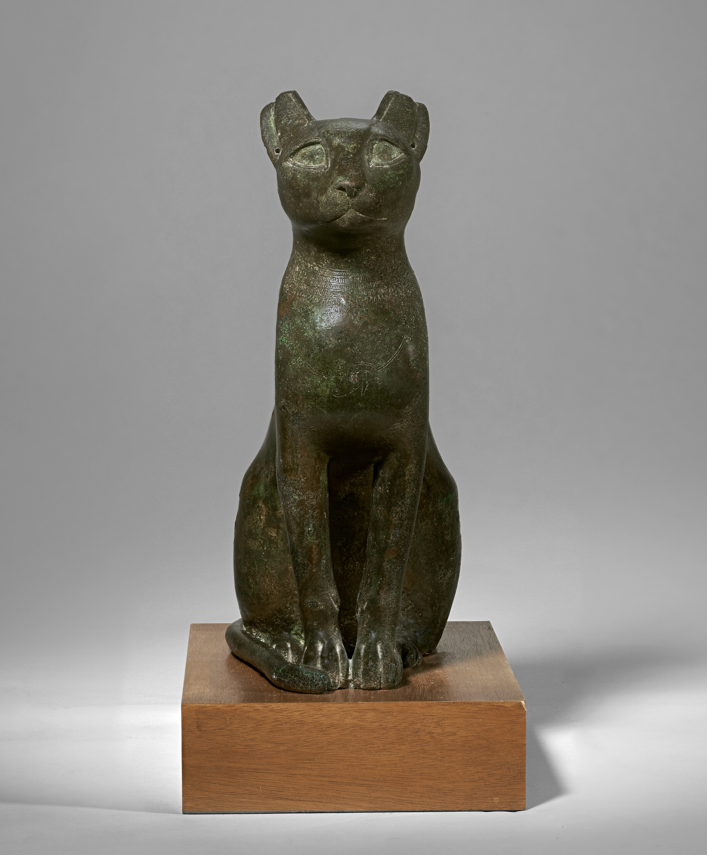 An Egyptian bronze cat, Ptolemaic period, c. 332-30 B.C. 14¾ in (37.4 cm) high. Estimate: $700,000-900,000. Offered in Antiquities on 12 April at Christie's in New York