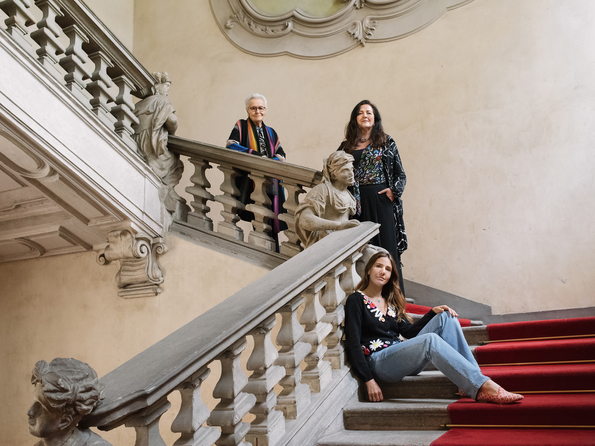 Rosita, Angela and Margherita on the staircase at Palazzo Clerici in Milan. Photo: Martina Giammaria