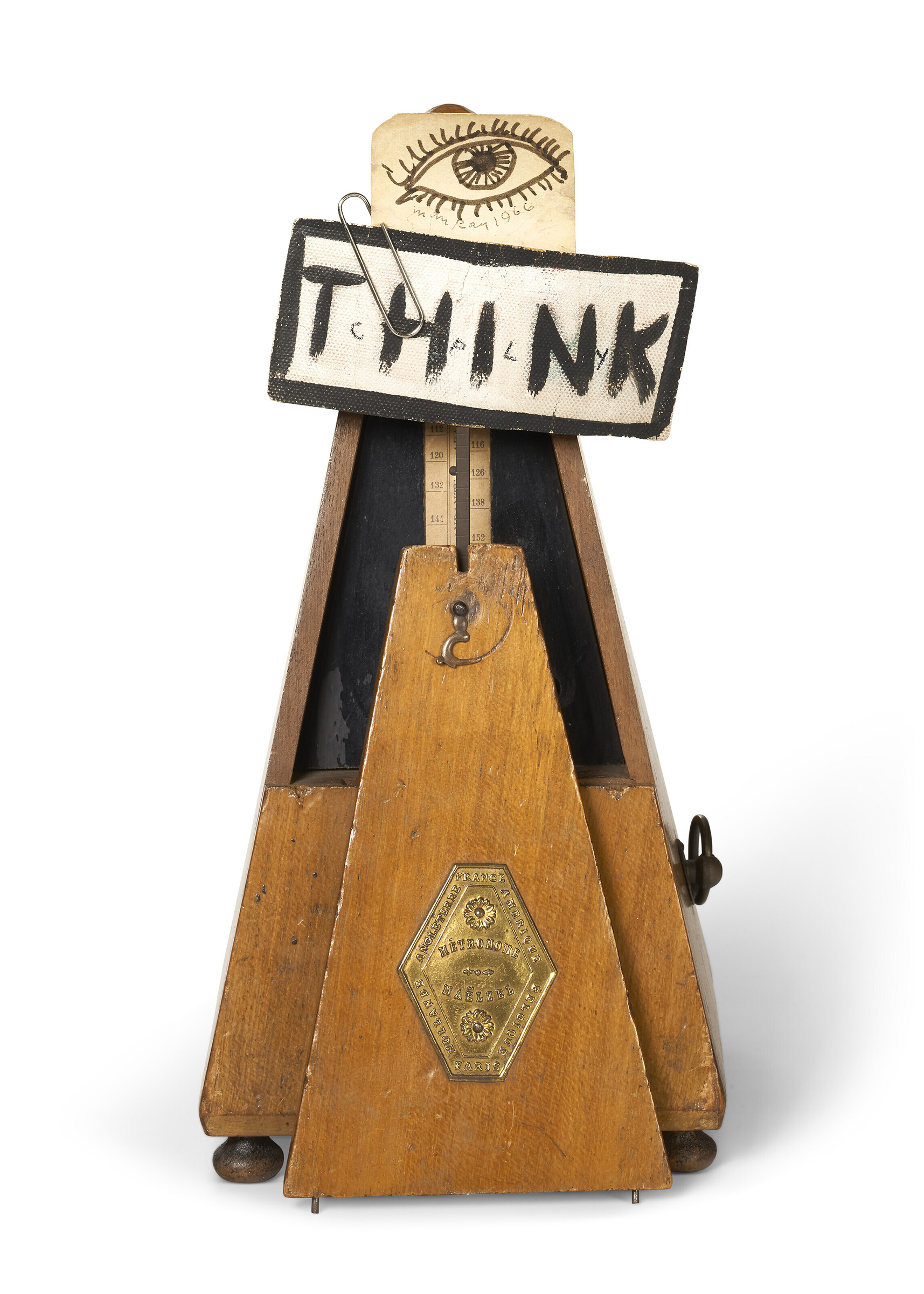 Untitled (Think), 1966. Metronome and paperclip with pen and black ink on paper by Man Ray (1890-1976) and oil on canvas by William Nelson Copley (1919-1996).Height: 8 3/4 in (22.2 cm) Width: 4 3/8 in (11 cm). Depth: 4 3/8 in (11 cm). Estimate: $100,000-150,000. Offered in The Surrealist World of Rosalind Gersten Jacobs and Melvin Jacobs&nbsp;in 14 May 2022 at Christie's in New York
