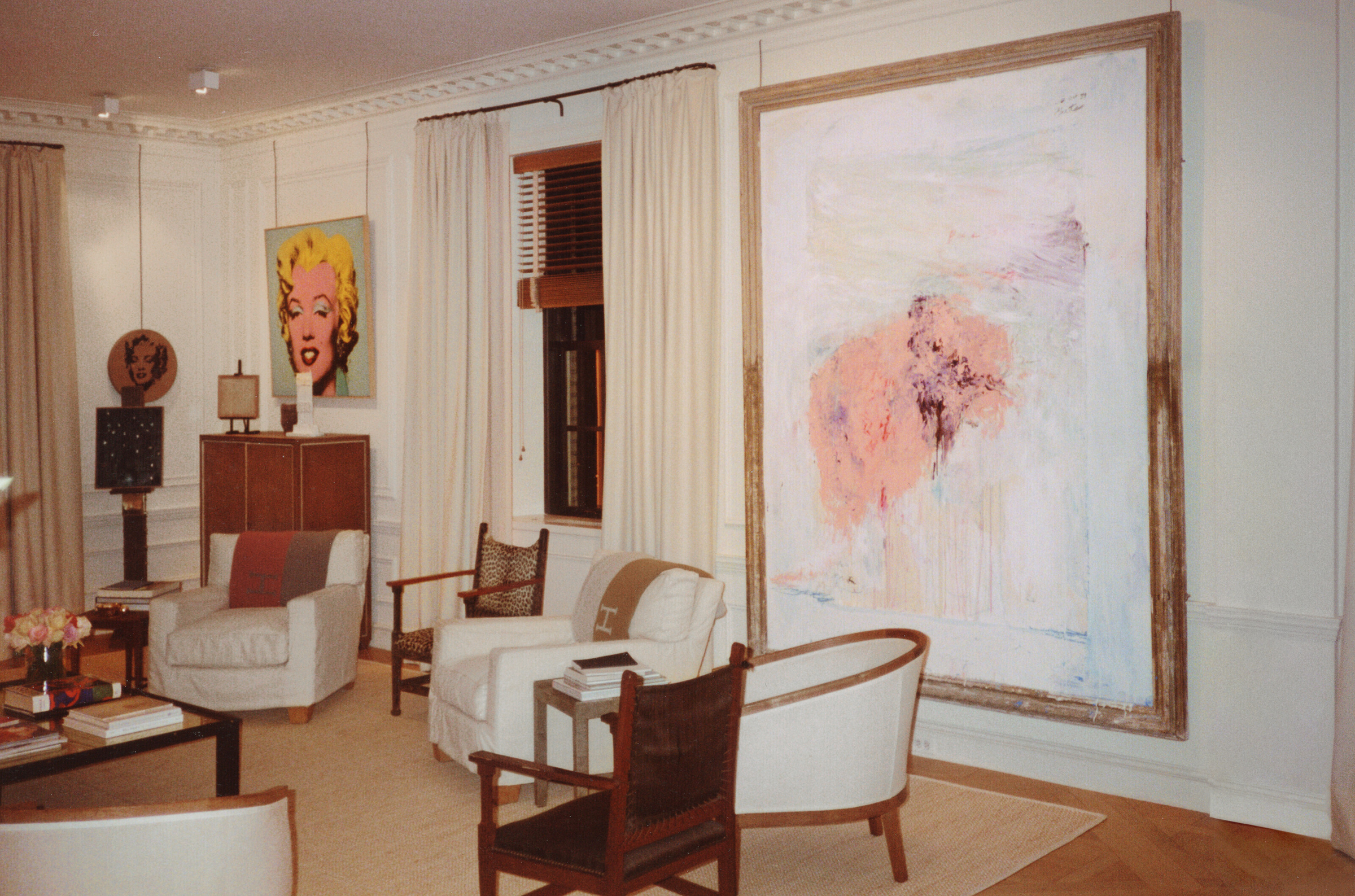 Installation view, Sturtevant (1924-2014), Warhol Gold Marilyn, 1973. Andy Warhol (1928-1987), Shot Sage Blue Marilyn, 1968; Cy Twombly (1928-2011), Venere Sopra Gaeta, 1988 in the Ammann residence, New York. Offered in The Collection of Thomas and Doris Ammann on 9 May 2022 at Christie’s in New York