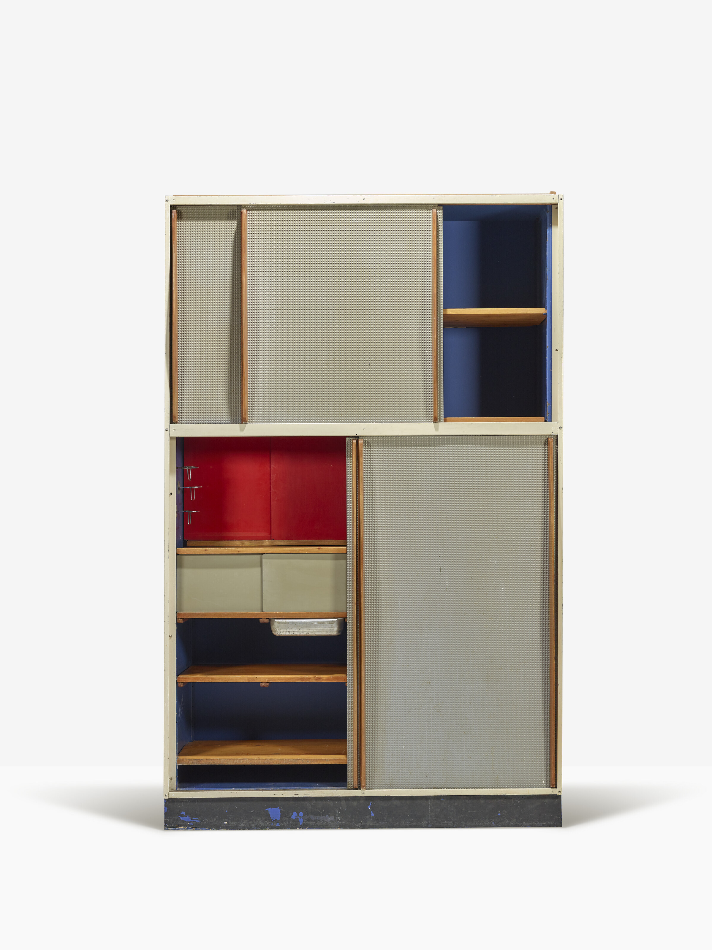 Charlotte Perriand (1903-99) and Jean Prouvé (1901-84), Brazza cabinet, 1950-51. Oak, partially painted fir, aluminium sheet, 'Pointe diamant' embossed aluminium sheet, folded painted steel sheet, chrome plated steel, thermoformed plastic and painted chipboard. 99¼ x 61¾ x 23⅝ in (252 x 157 x 60 cm). Estimate: €100,000– 150,000. Offered in Design on 25 May 2022 at Christie's in Paris