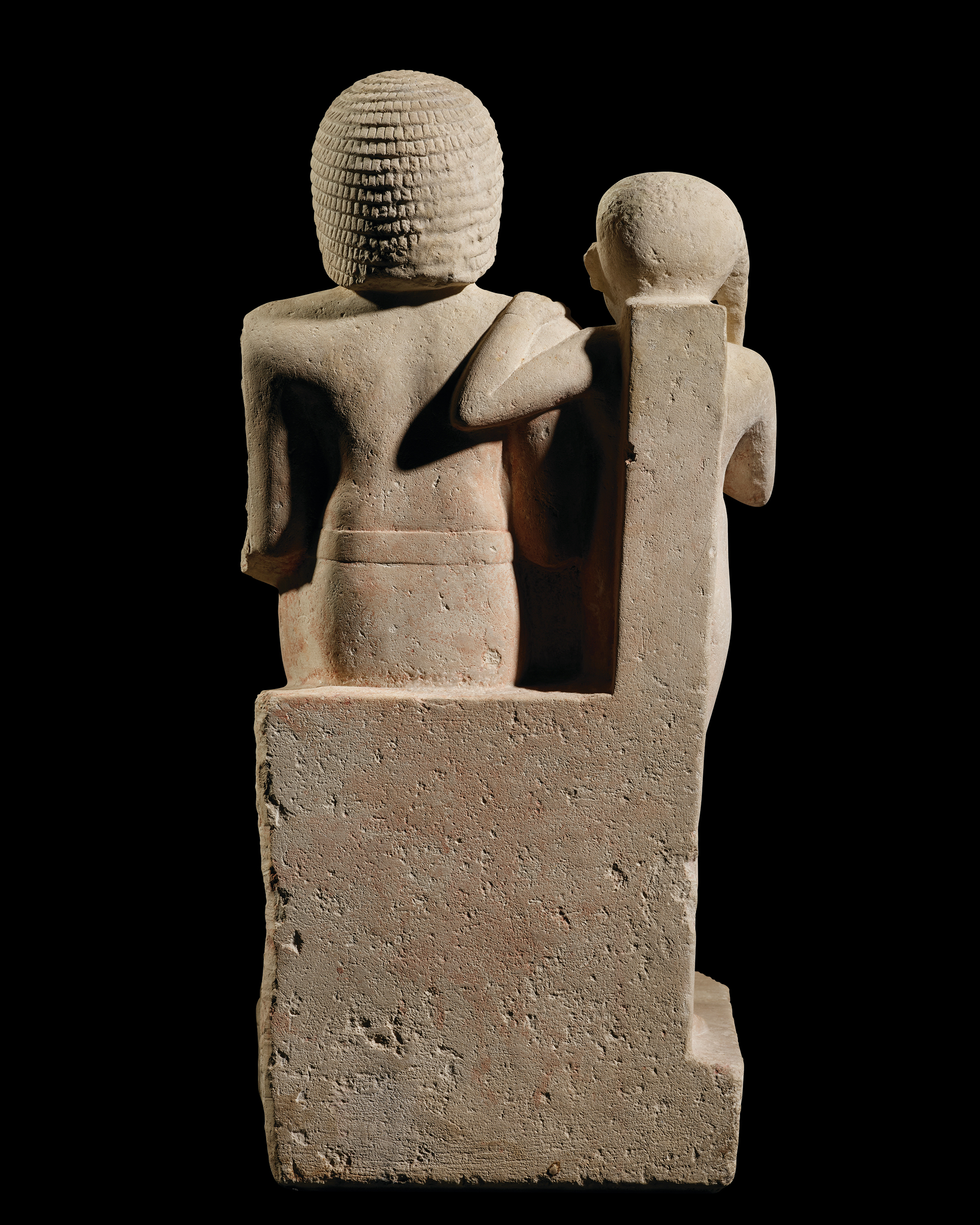An Egyptian limestone group statue for Mehernefer and his son. Old kingdom, mid-late 5th dynasty, circa 2400-2300 B.C. Sold for £6,014,500 on 7 July 2022 at Christie's in London