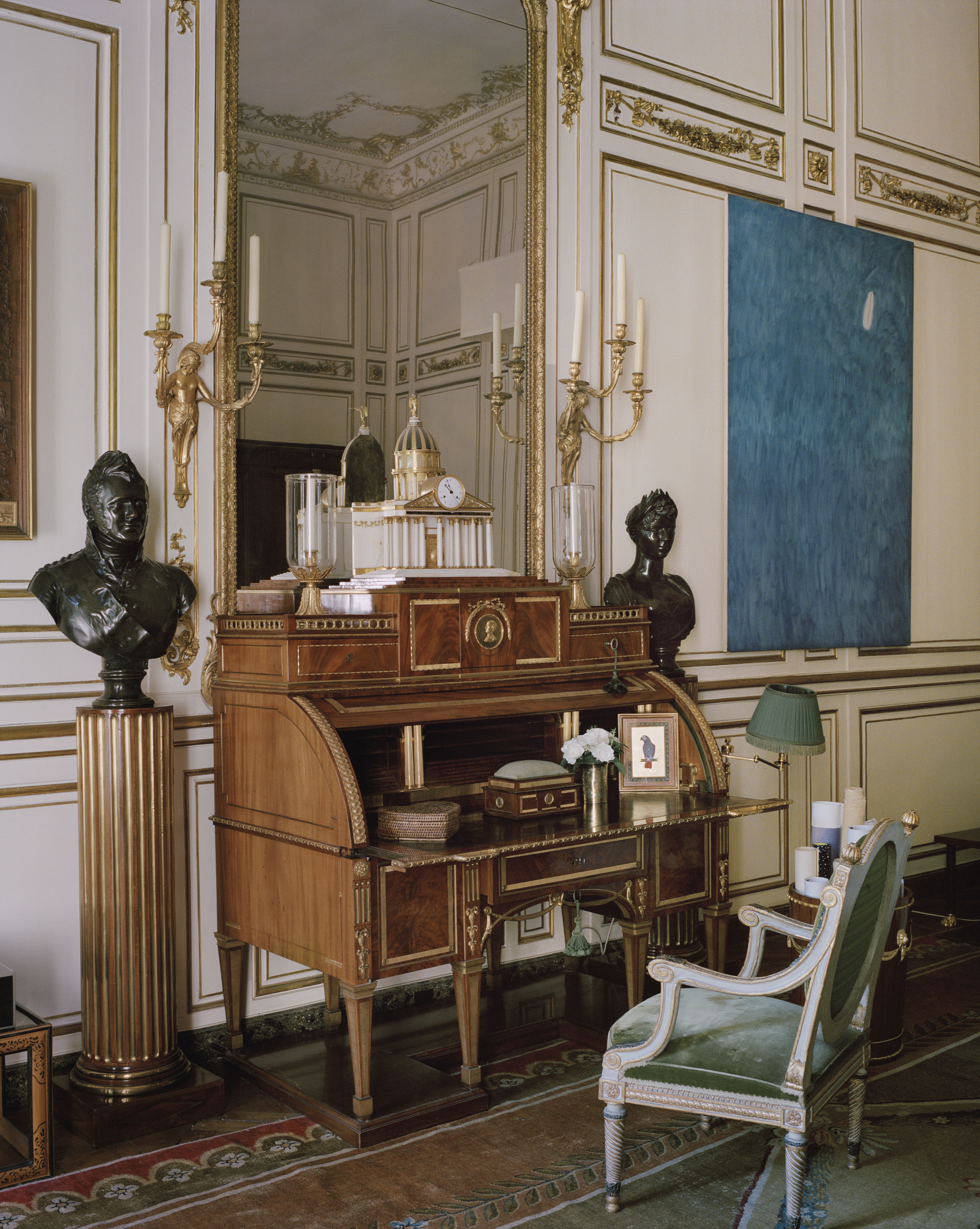 Lots from the sale, including Joan Miró (1893-1983), Le Passage de l'oiseau-migrateur, 1968, and David Roentgen (1743-1807) and François Remond (c. 1745-1812), A Louis XVI ormolu-mounted mahogany mechanical cylinder desk, c. 1780, on display at Hôtel d'Orrouer, Salon © François Halard
