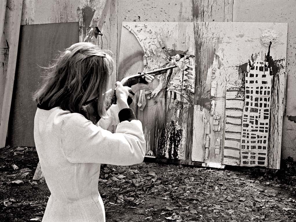 Niki de Saint Phalle during a shooting session at Impasse Ronsin, Paris, 1962, photo by Andre Morain
