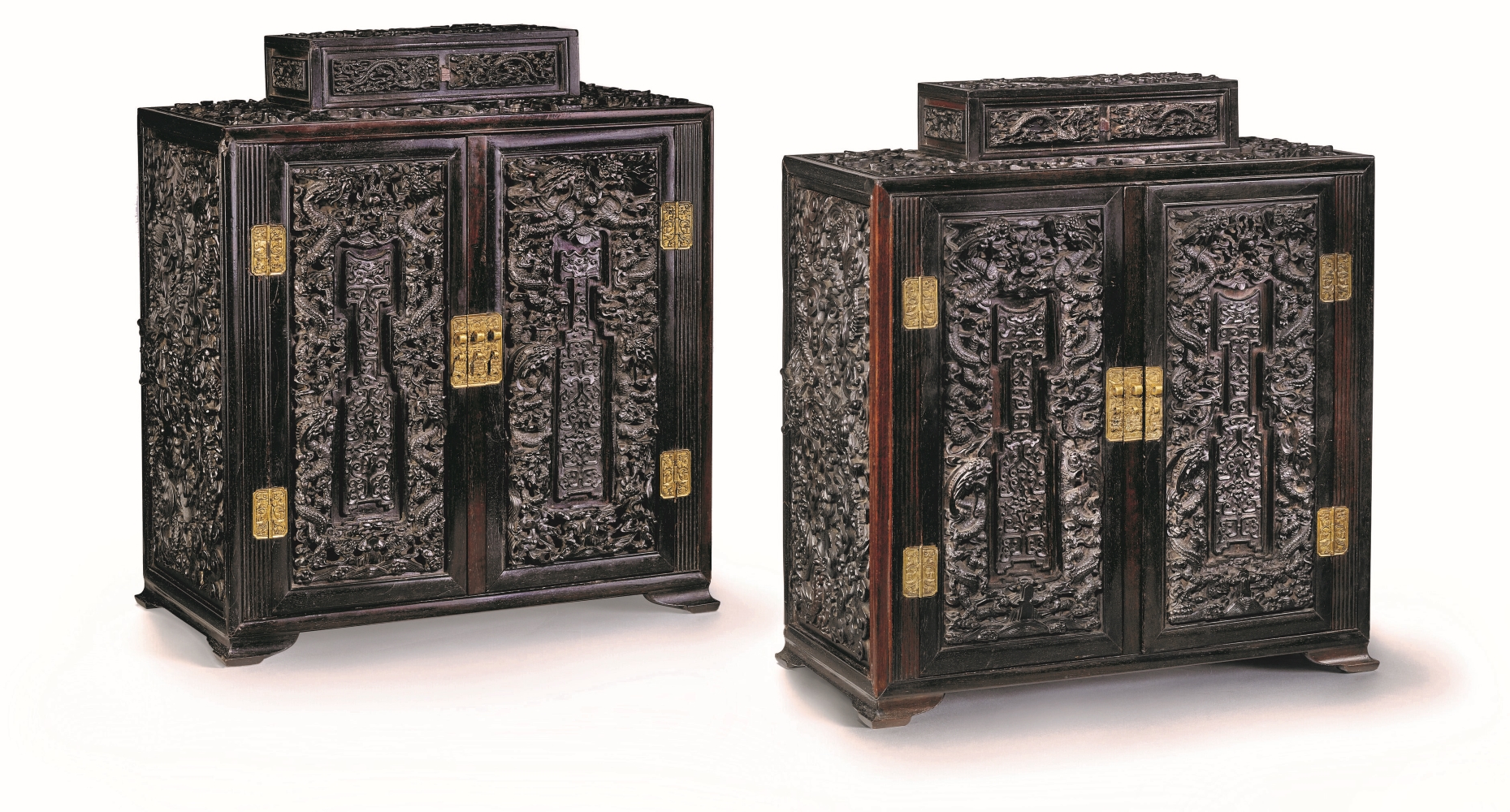 An exceptional pair of zitan cabinets, China, Qing dynasty, 18th-19th century. Height: 19¼ in (49 cm); Length: 17⅛ in (43.5 cm); Depth: 8⅝ in (22 cm). Estimate: €60,000-80,000. Offered in Art d'Asie on 6 July at Christie's Paris
