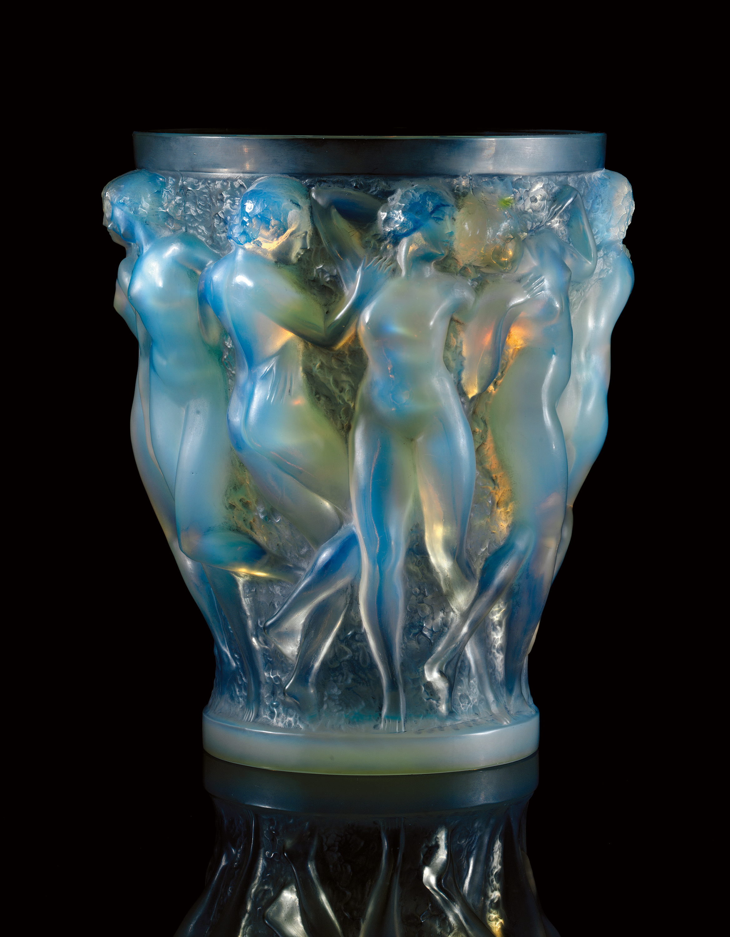 A &lsquo;Bacchantes&rsquo; opalescent vase with gray patina, model introduced 1927, by Ren&eacute; Lalique. 9&frac34; in (25 cm) high. Sold for $48,000 on 18 December 2006 at Christie&rsquo;s in New York