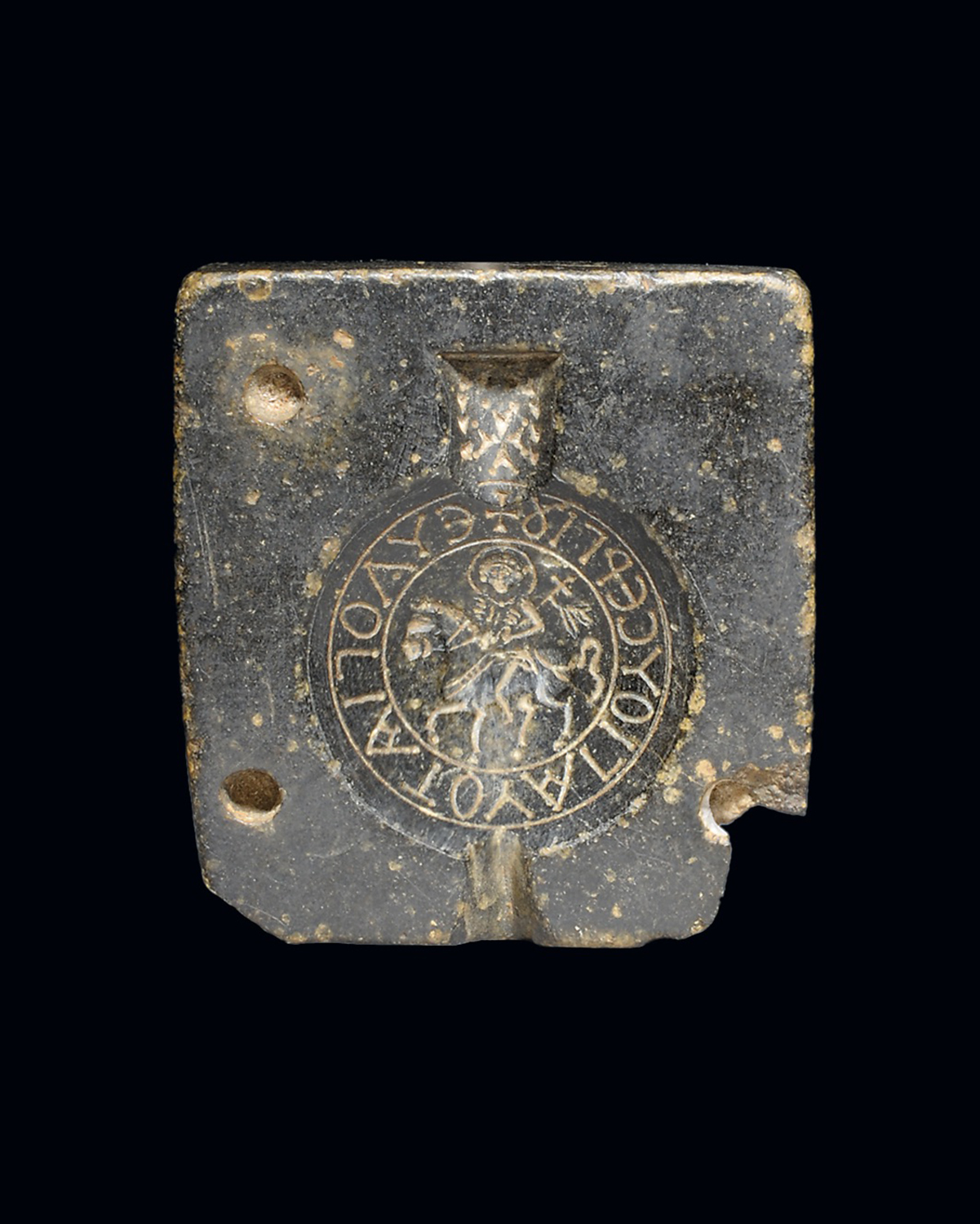 A Byzantine steatite mould for an ampulla, circa 5th-6th century A.D., sold for £6,875 on 27 October 2009 at Christie's in London
