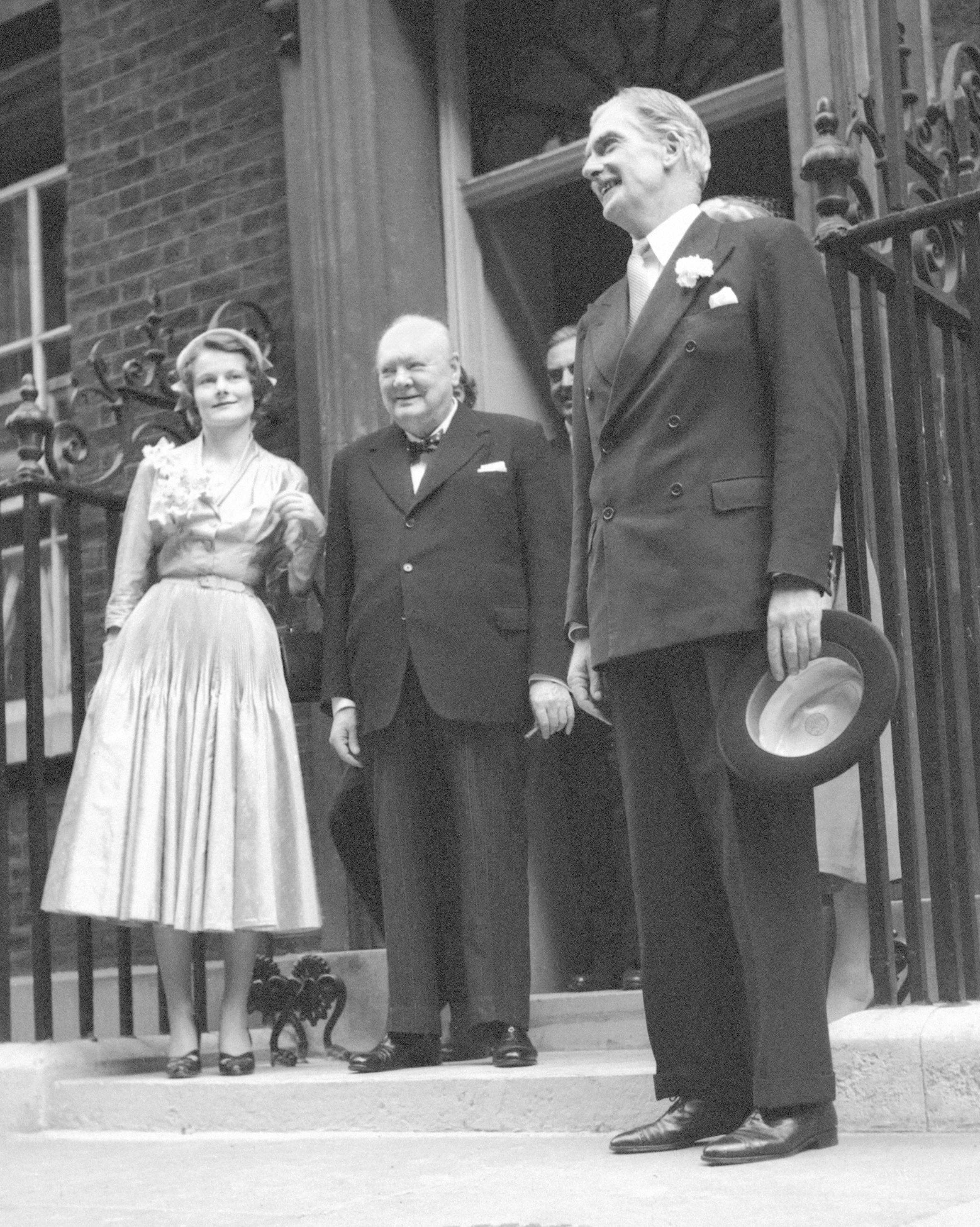 Anthony Eden and Clarissa Spencer-Churchill at 10 Downing Street on the day of their wedding, with Winston Churchill, 1952. Eden was British Foreign Secretary three times, between 1935-38, 1940-45 and 1951-55. Photo: © Mirrorpix
