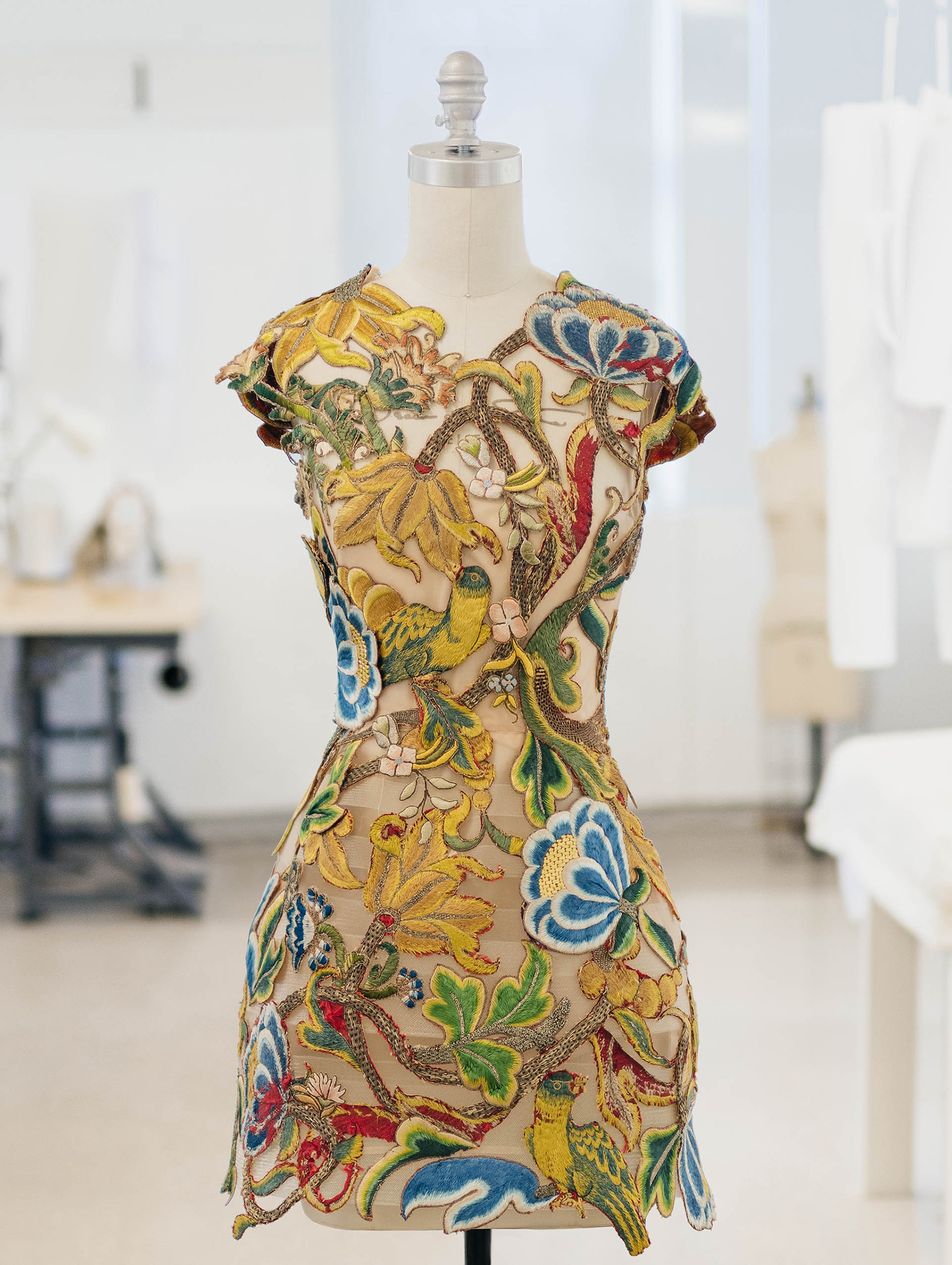 A 'flora and fauna' threadwork and hand embroidered cocktail dress with open back, Oscar de la Renta, 2022. Sold for $13,860 in The Ann & Gordon Getty Collection: Jewelry and Handbags on 24 October 2022 at Christie’s online