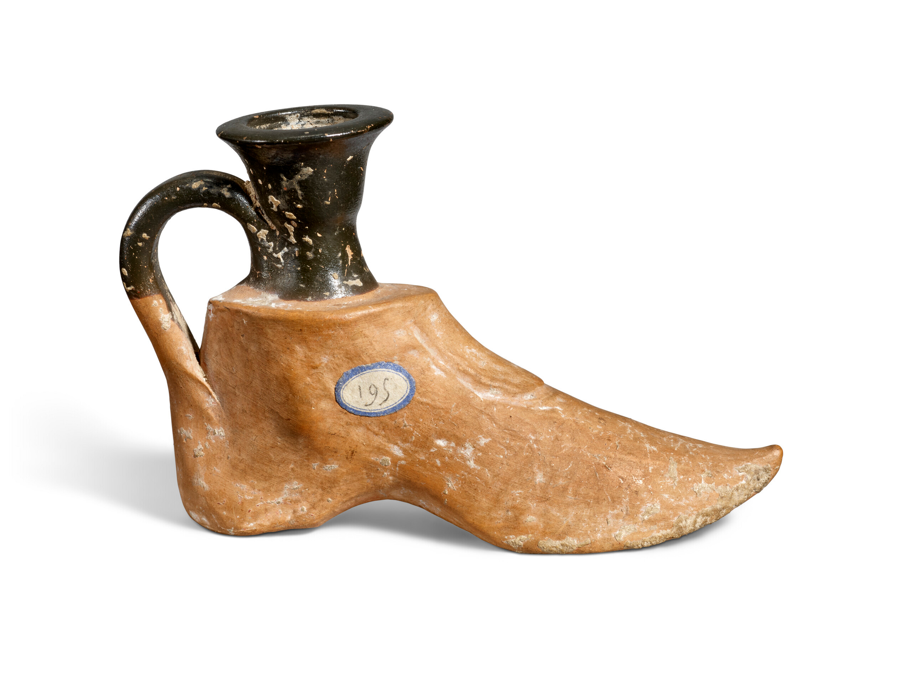 An Attic pottery figural askos, circa 4th century BC. 3⅝ in (9.3 cm) long. Sold for £3,276 on 7 December 2022 at Christie’s in London