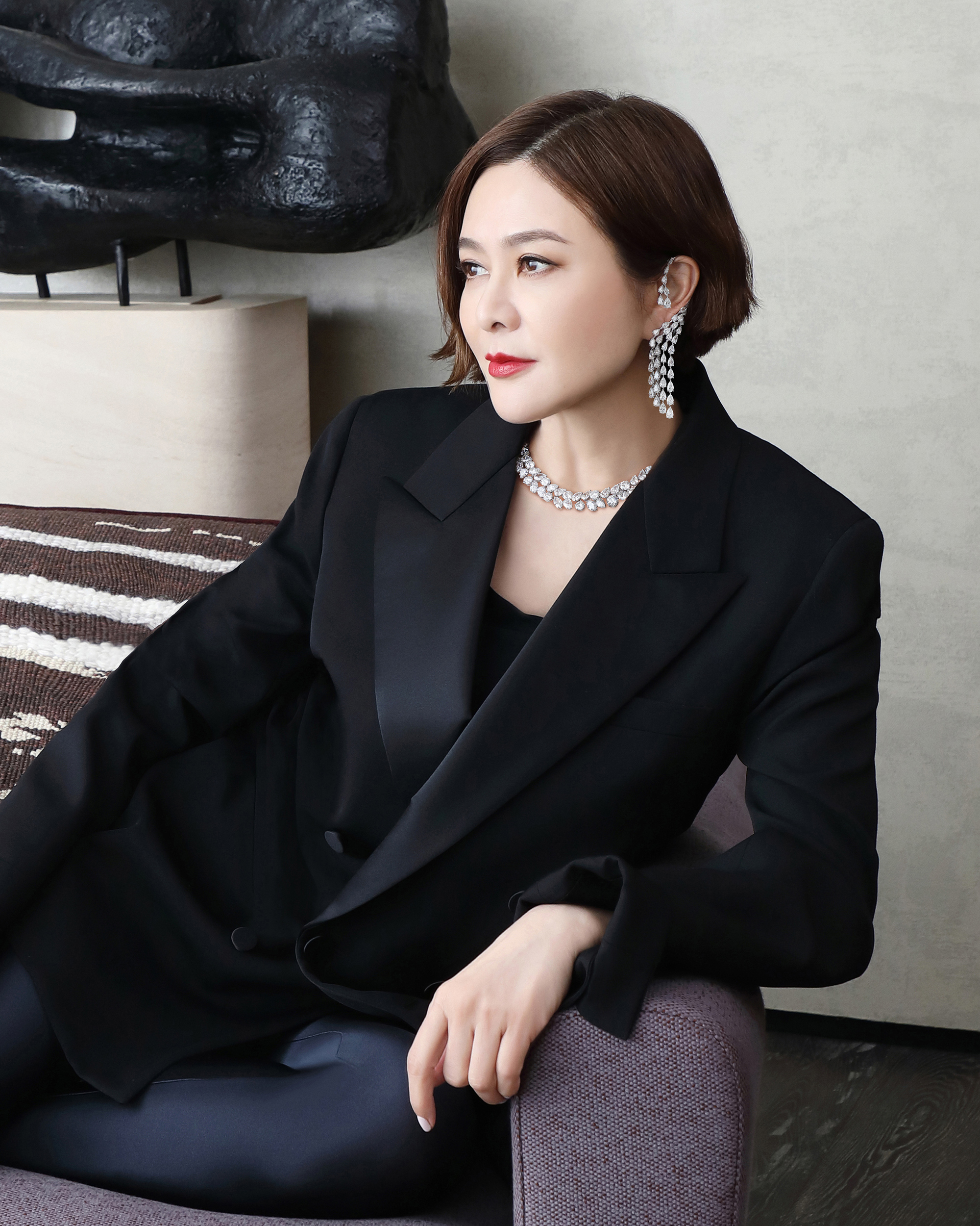 On Rosamund: A diamond necklace. Sold for HK$3,339,000. A pair of diamond ear hoop. Sold for HK$604,800 in Magnificent Jewels on 28 November 2022 at Christie’s in Hong Kong