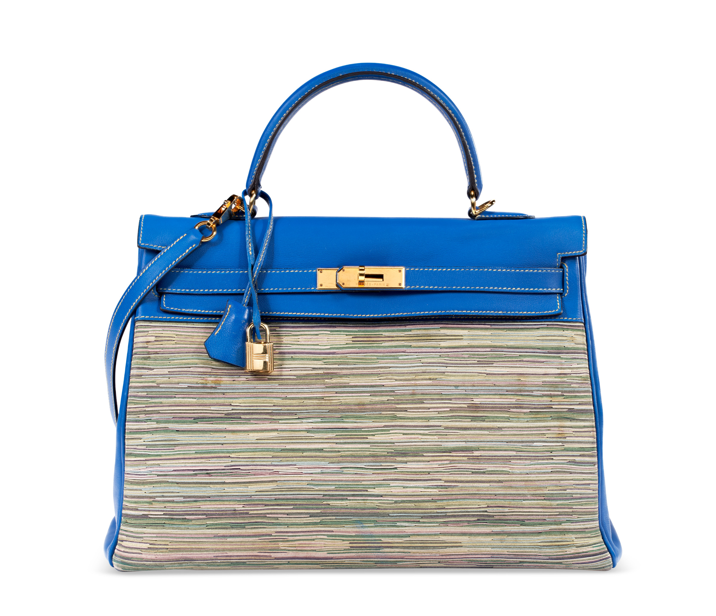 A limited edition bleu roi evercolor leather vibrato Retourné Kelly 35 with gold hardware, Hermès, 2002. Estimate: $12,000-$15,000. Offered in Handbags Online: The New York Edit from 28 November-12 December at Christie’s online