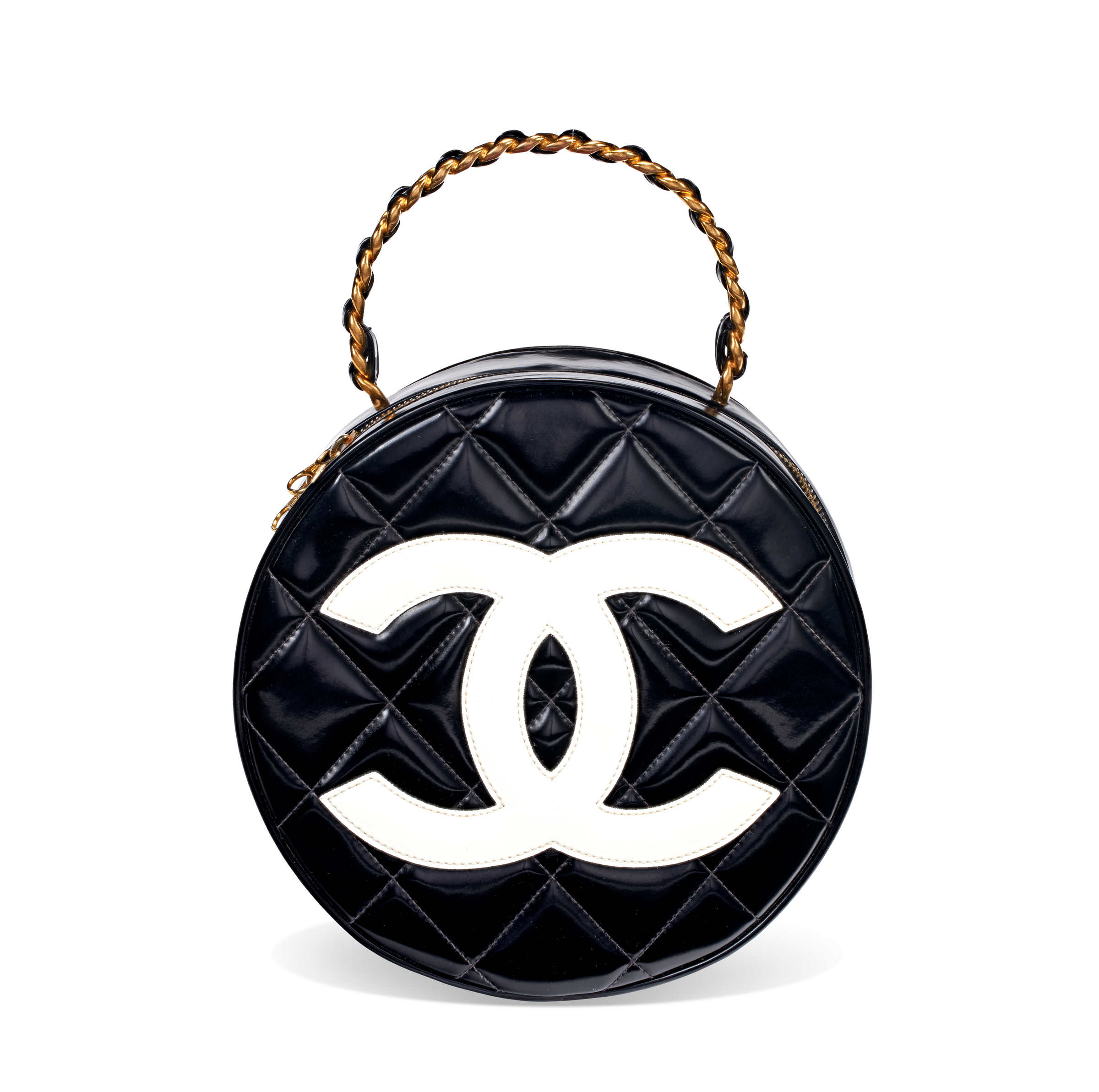 A round black patent leather vanity bag with gold hardware, Chanel, 1994. Estimate: $12,000-$15,000. Offered in Handbags Online: The New York Edit from 28 November-12 December at Christie’s online