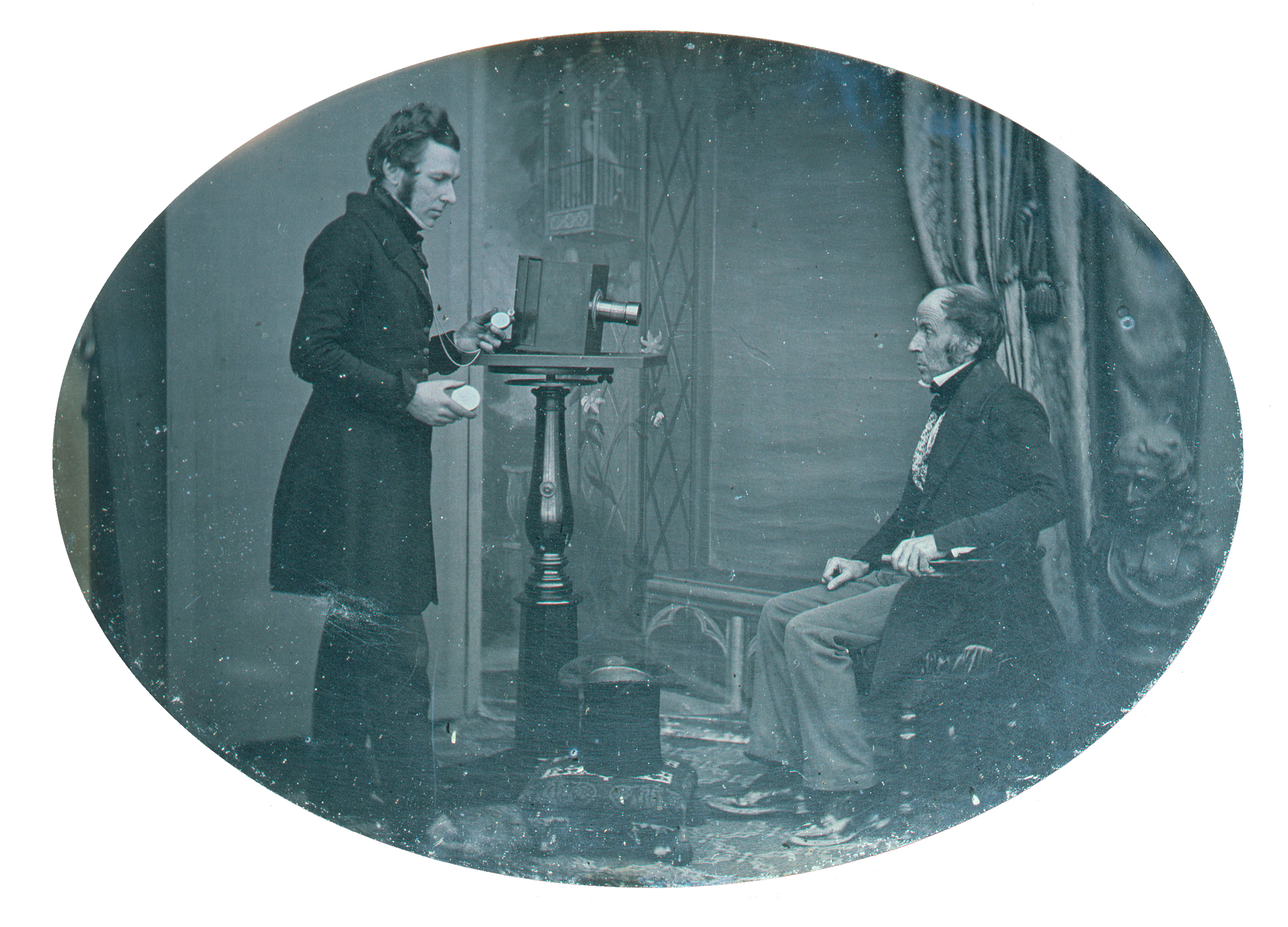 Jabez Hogg and Mr Johnson, 1843. Hogg (1817-1899) is making a daguerreotype of Johnson, timing the exposure with his watch. The daguerreotype was probably taken to illustrate Hogg’s A Practical Manual of Photography. Photo: Science & Society Picture Library / Getty Images