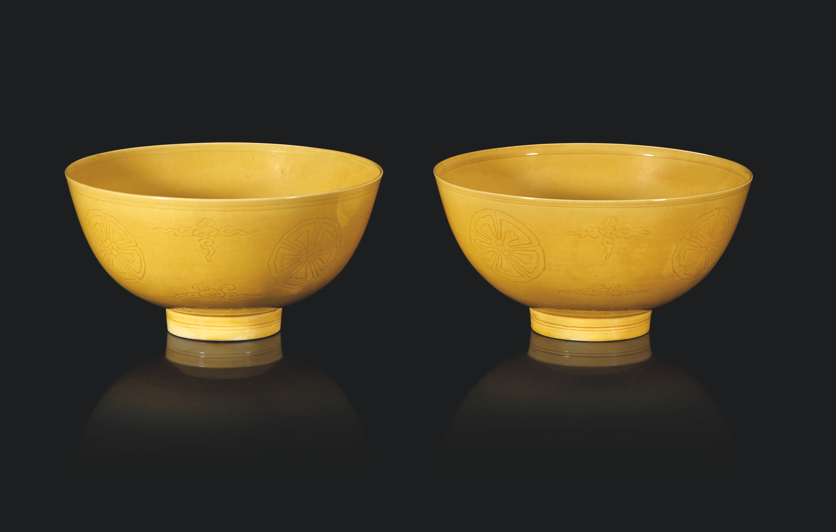 A pair of yellow porcelain bowls, Qing dynasty, Kangxi period (1662-1722). Diameter: 12 cm (4¾ in). Estimate: €60,000-80,000. Offered in From Beijing to Versailles, the V.W.S. collection on 13-14 December at Christie’s in Paris