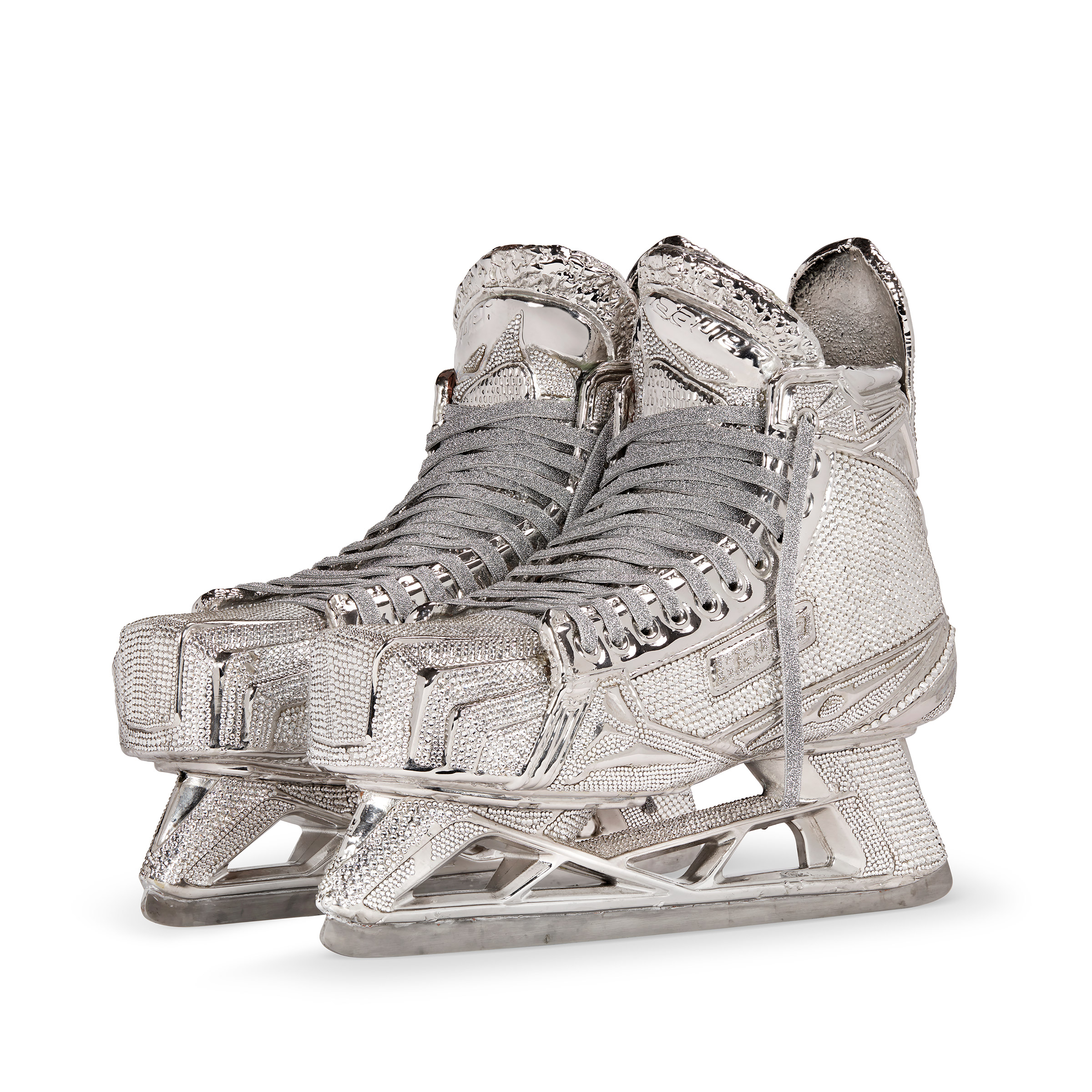 Henrik Lundqvist’s game worn and signed skates, encased in chromed copper and nickel, bejewelled with Swarvoski crystals. Don Blanton, 2022. Estimate: $50,000-70,000. Offered in The Greats on 29 November-6 December at Christie’s online