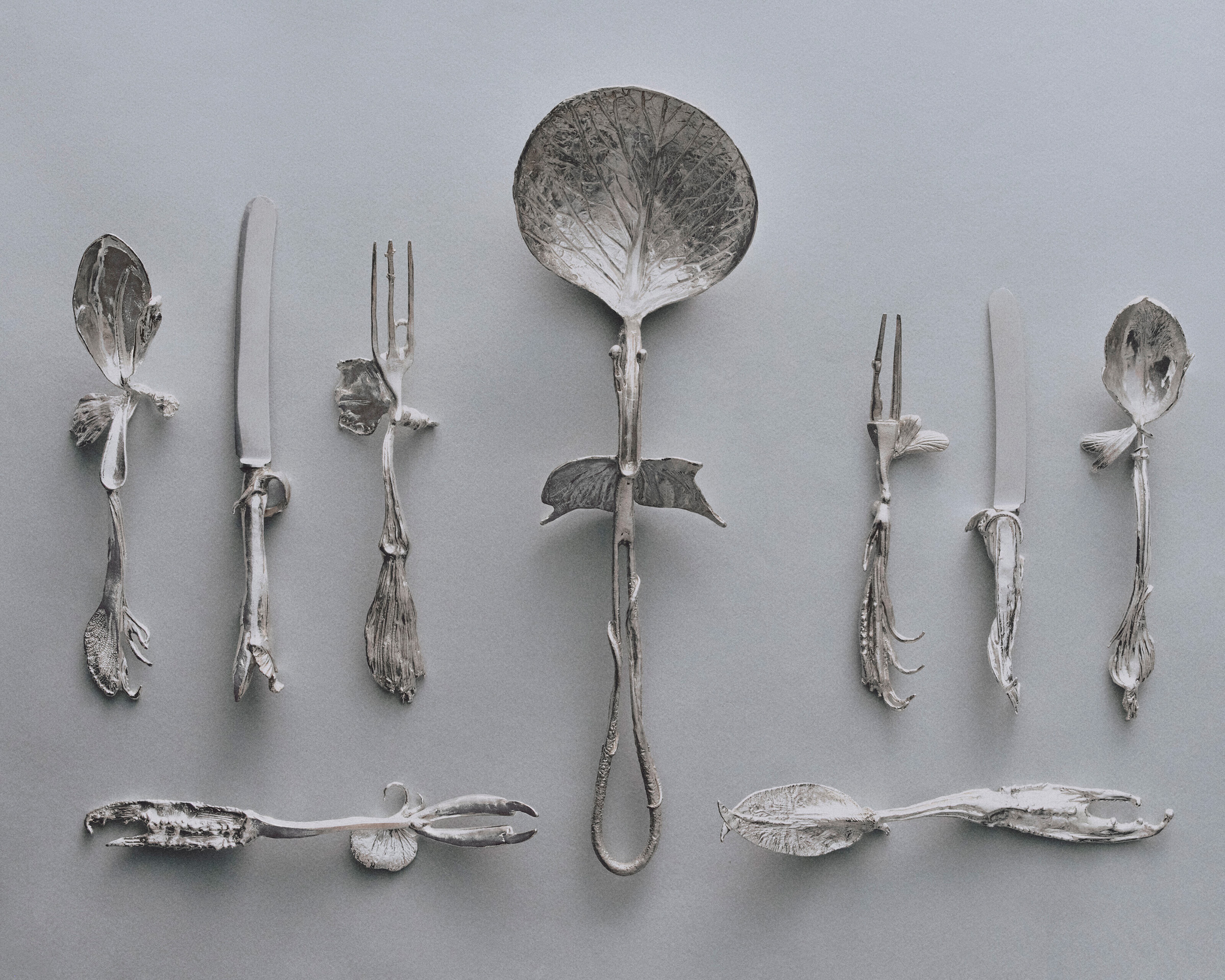 Claude Lalanne (1925-2019), Iolas Flatware Service, c. 1966. Silver. Comprising 60 pieces, largest: 14¼ in (36.3 cm) long. Sold for $201,600 in Sculpting Paradise: The Collection of Marie Lalanne on 7 December 2022 at Christie’s in New York
