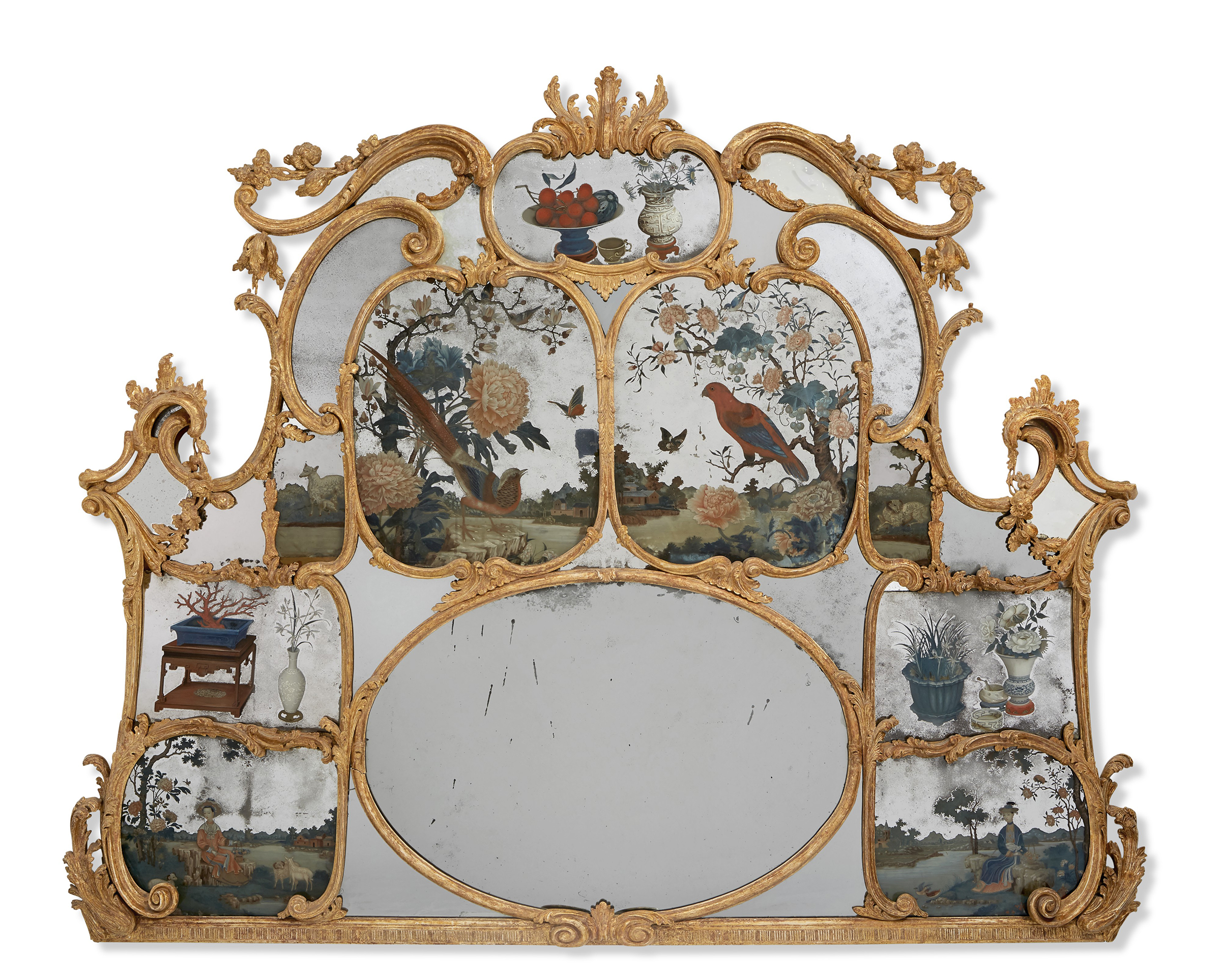 A George II giltwood and Chinese reverse painted glass overmantel mirror, 1760. 58 in (147.5 cm) high, 73 in (185.5 cm) wide. Estimate: $100,000-200,000. Offered in The Collection of Pierre Durand on 27 January 2022 at Christie&rsquo;s New York