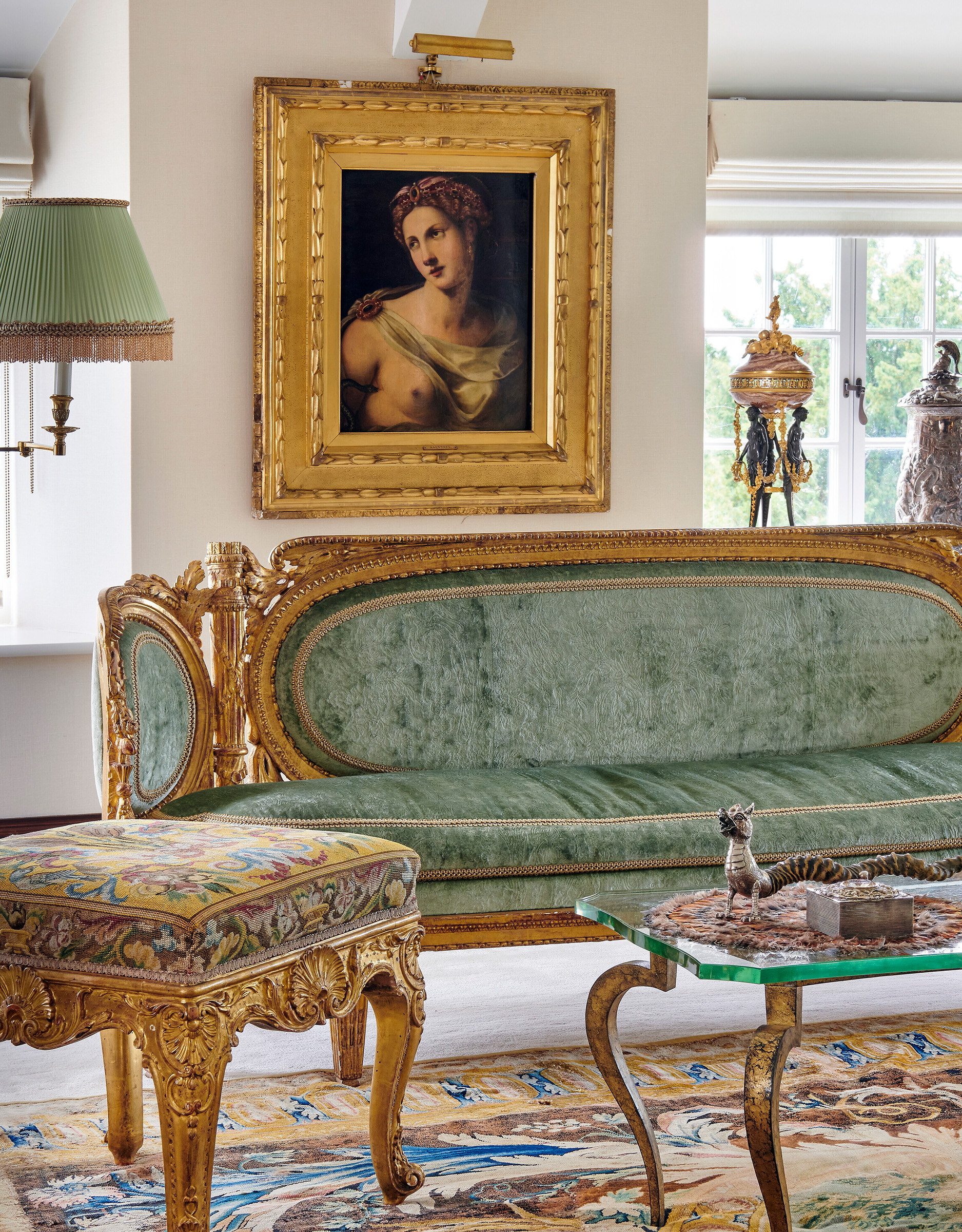 The Morning Room with Cleopatra by Michele Tosini (1503-1577) (sold for £35,280), above a Louis XVI giltwood canapé by Georges Jacob, circa 1775. A silver-mounted horn smoker’s companion, mark of Joseph Braham, London, 1905 (sold for £2,016) sits on a French gilt-lacquered bronze and glass low table, attributed to Maison Jansen, Paris, mid-20th century. Sold on 9 February 2023 at Christie’s in London