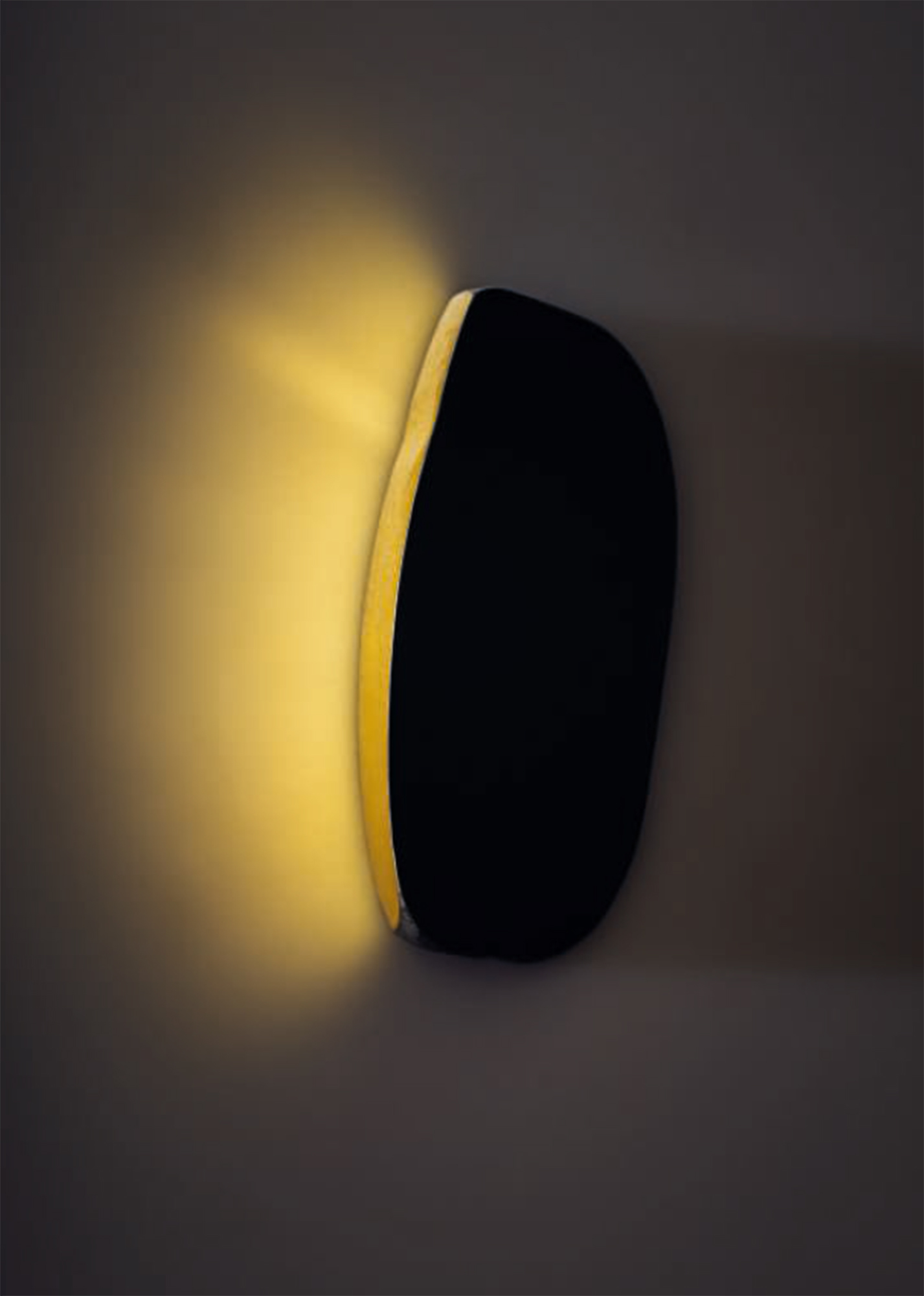 South Light, 2001. Hammered pure gold inlet, hand-carved steel wall light. Photo: Geordie Wood