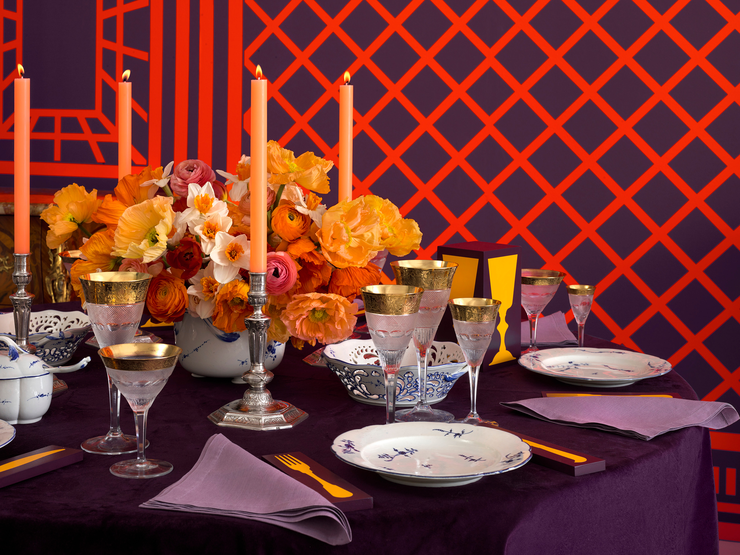 The Paris Edit: a Chantilly porcelain part dinner service, 18th century (&euro;15,000-20,000) and a set of four R&eacute;gence silver candlesticks, Paris, 1717 (&euro;15,000-20,000) alongside a Moser part crystal &lsquo;Splendid&rsquo; service, 1907 (&euro;3,000-5,000). All offered in The Collector: Le Go&ucirc;t Fran&ccedil;ais, 4-20 April 2023 at Christie&rsquo;s Online