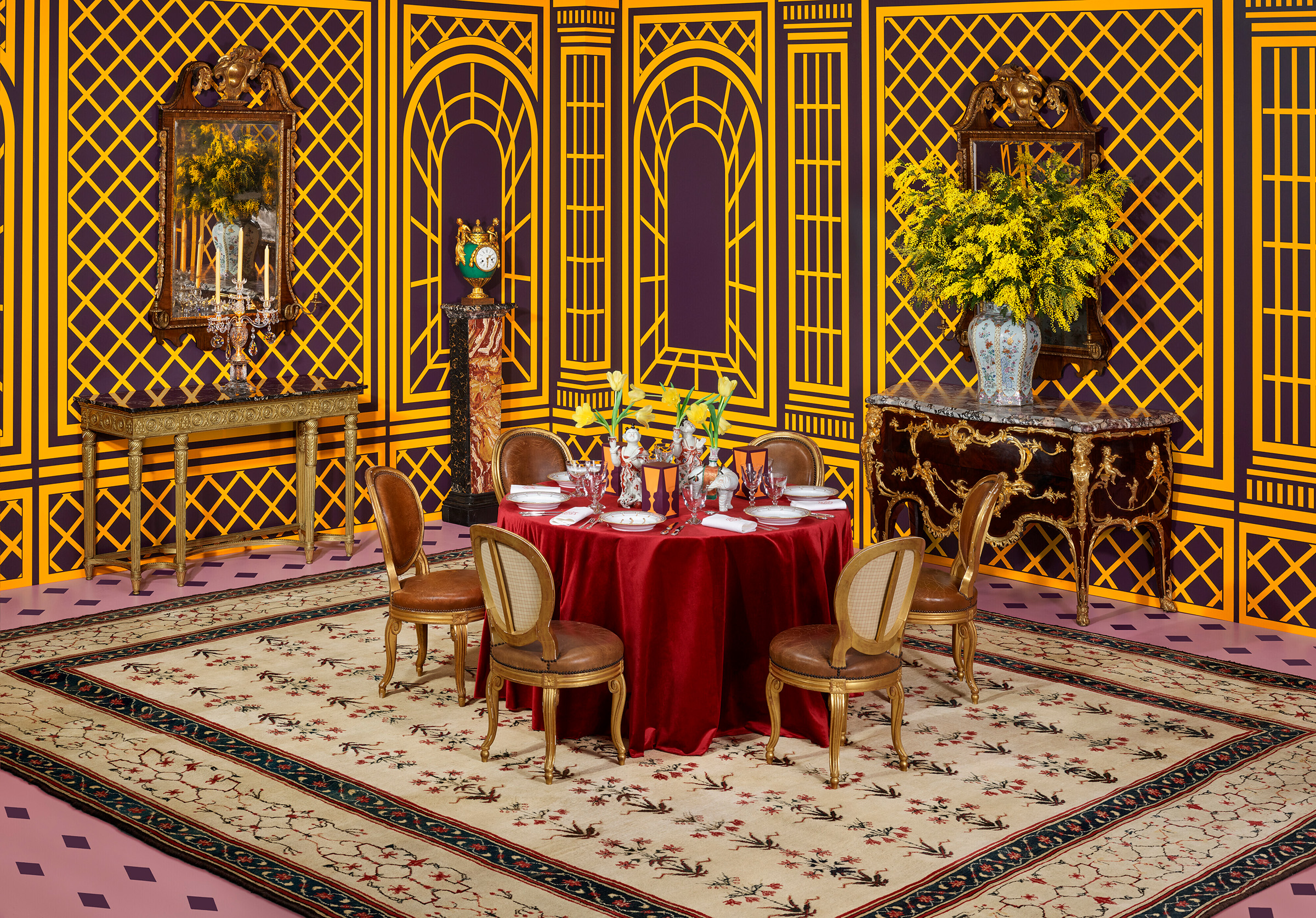 The New York Edit (clockwise from left): a George III side table, circa 1790 ($7,000-10,000); one of a pair of George III cut-glass and ormolu candelabra, circa 1790 ($20,000-30,000); a pair of George II girandole mirrors, circa 1730 ($40,000-60,000); a late Louis XV ormolu-mounted and Sèvres porcelain mantel clock, circa 1770 ($20,000-40,000); a French ormolu-mounted kingwood and satinwood commode, by Maison Krieger, late 19th/early 20th century ($25,000-35,000); and an Agra carpet, North India, circa 1900 ($40,000-60,000). All offered in The Collector: New York, 4-19 April 2023 at Christie’s Online