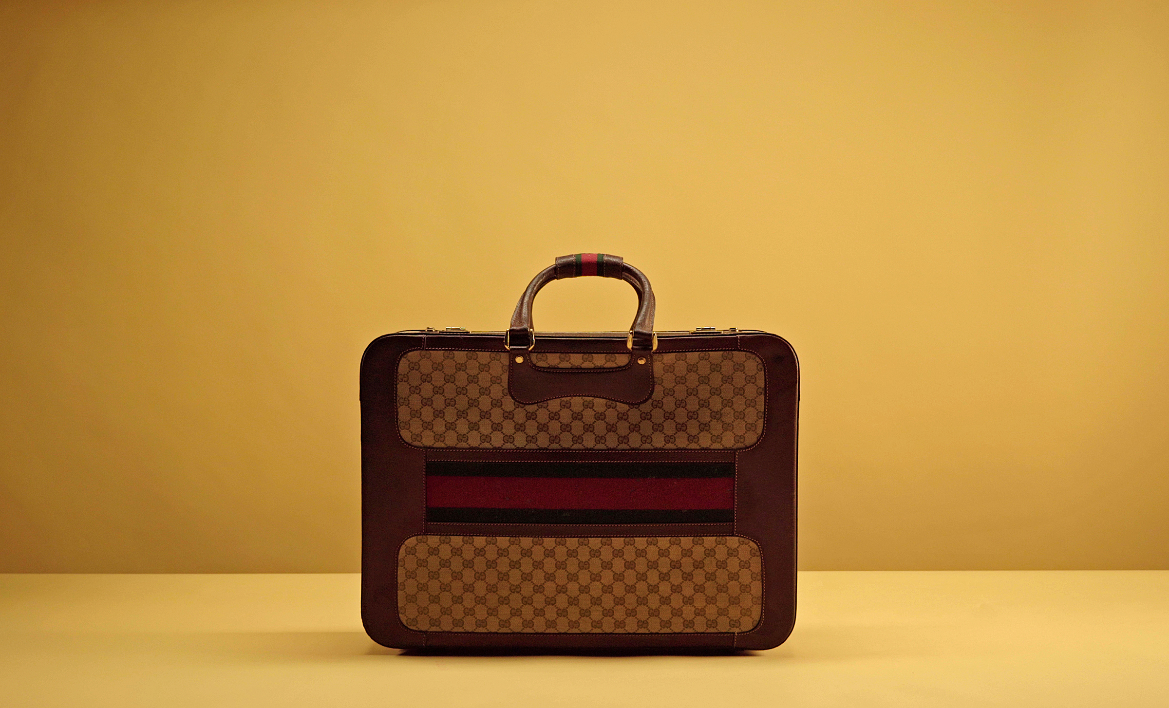 A GG monogram suitcase from the Gucci Archive; the distinctive monogram is a 1960s update of Gucci’s earlier Diamante design. Photo: Courtesy of Gucci Vault