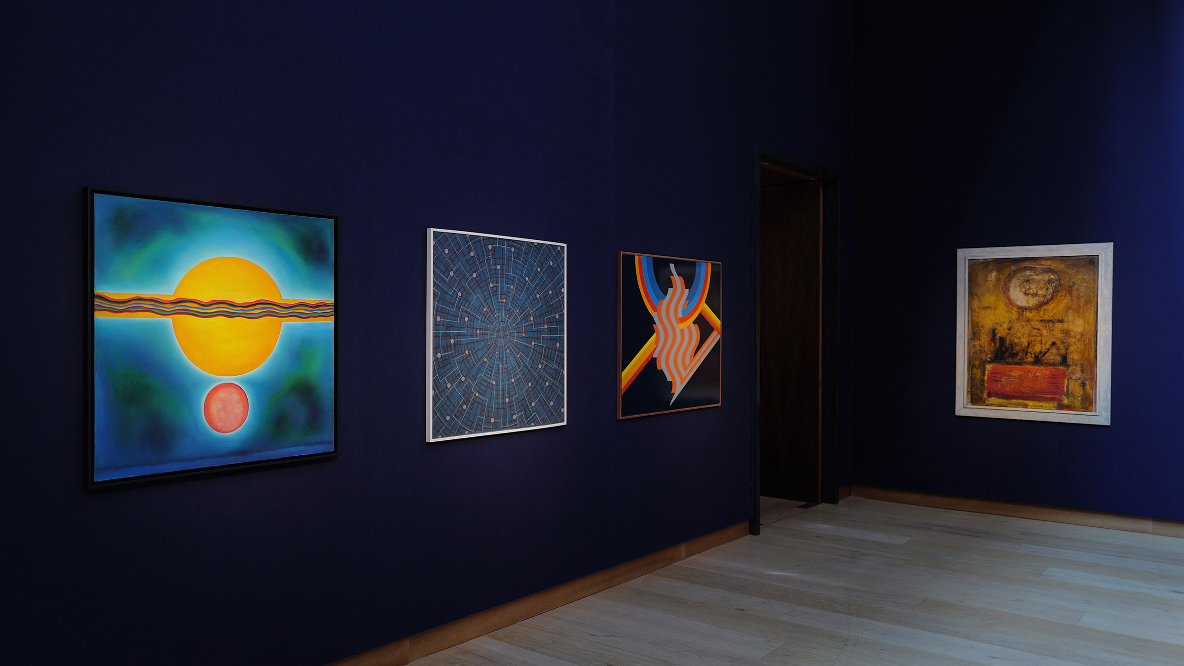 Installation view of Kawkaba: Highlights from the Barjeel Art Foundation at Christie’s in London. Left to right: Samia Osseiran Jumblatt (Lebanon, b. 1944), Formative Radiation, 1970; Menhat Helmy (Egypt, 1925-2004), Space Exploration/Universe, 1973; Mohamed Melehi (Morocco, 1936-2020), Untitled, 1975; Hussein Shariffe (Sudan, 1934-2005), Big Red, 1958. Courtesy of Barjeel Art Foundation. Photo: Amir Hazim