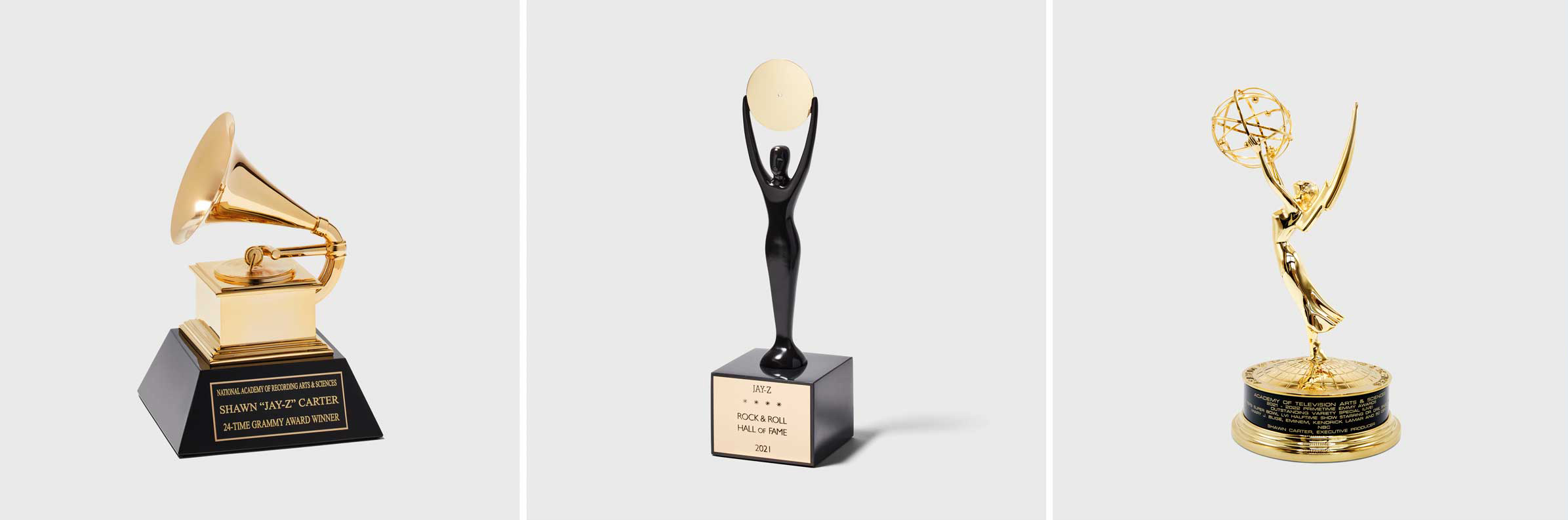 Left: Grammy Award, 2023. Exclusively created for The Book of HOV exhibit; Center: Rock & Roll Hall of Fame Award, 2021; Right: Emmy Award, 2022. Outstanding Variety Special, Outstanding Production Design for A Variety Special, Outstanding Music Direction.