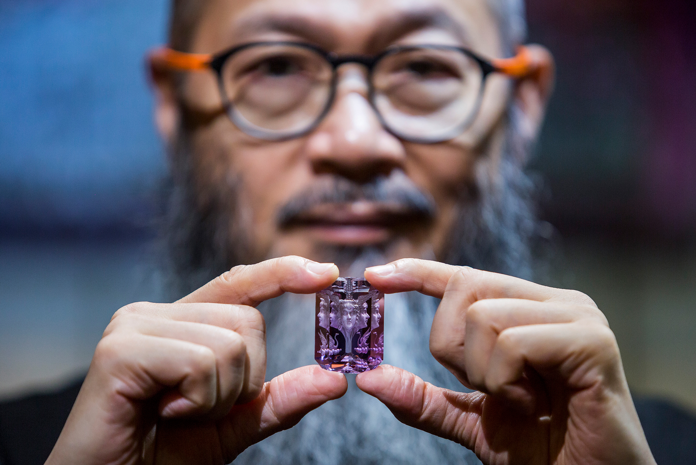 Chan showing the Wallace Cut, which requires precise faceting and reverse carving to produce designs with a three-dimensional effect.