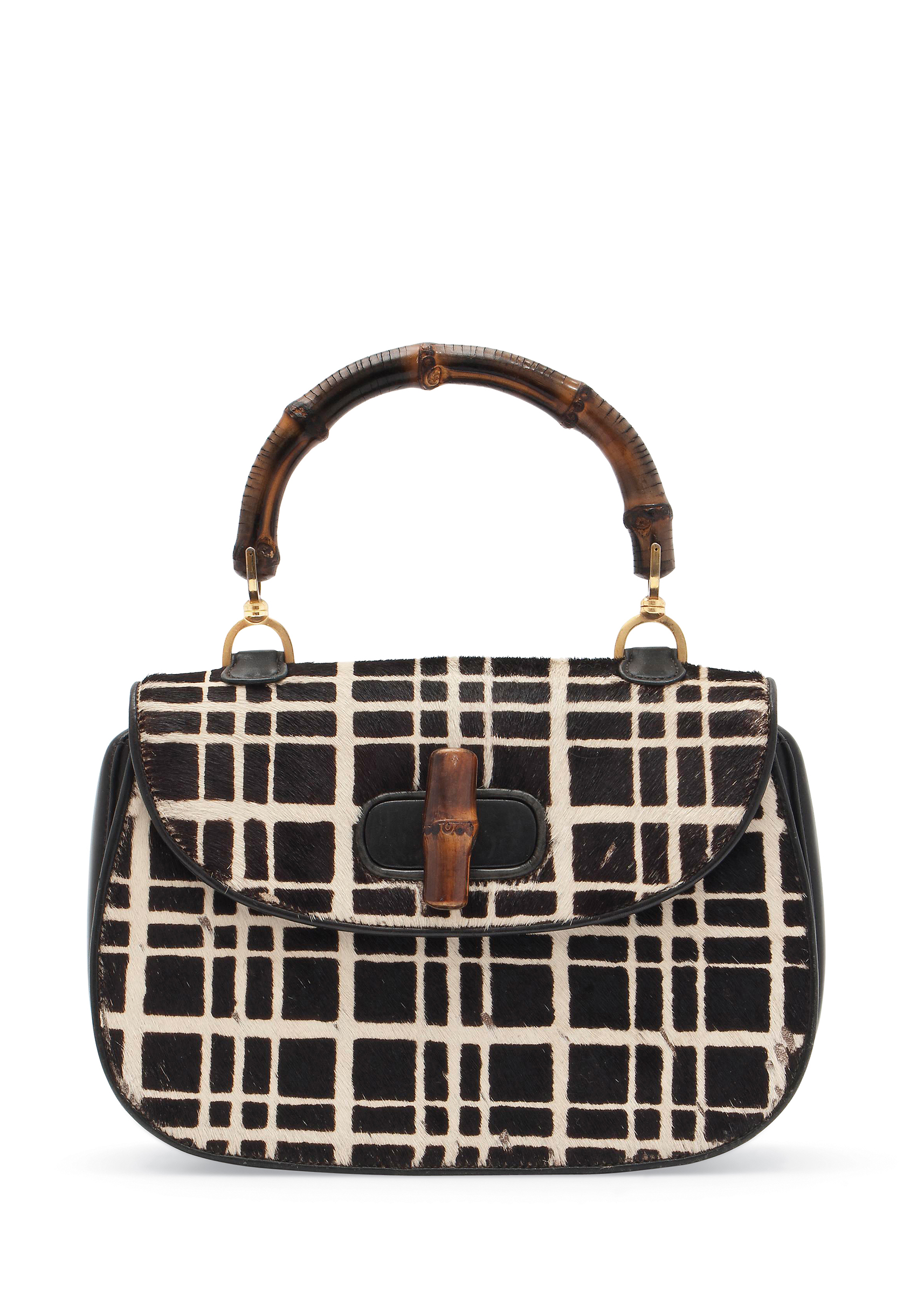 A black and white pony skin and leather Bamboo bag, Gucci, probably 1970s. Sold for £1,062.50 on 1 October 2014 at Christie's Online