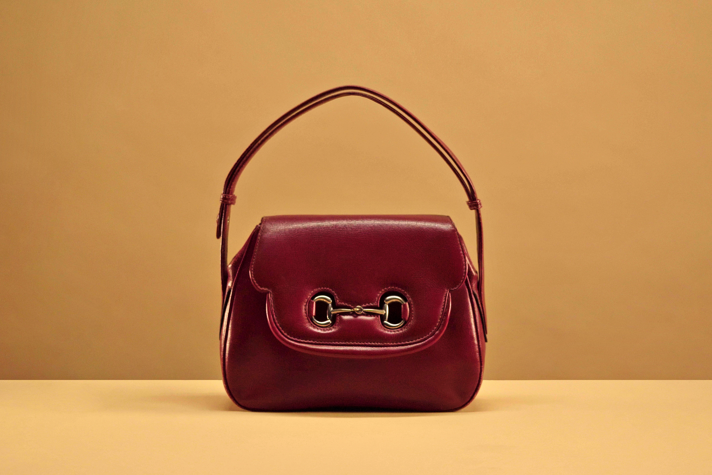 From the Gucci Archive, a shoulder bag in red palmellato calfskin with silver clamp, first half of the 1950s. Photo: Courtesy of Gucci Vault