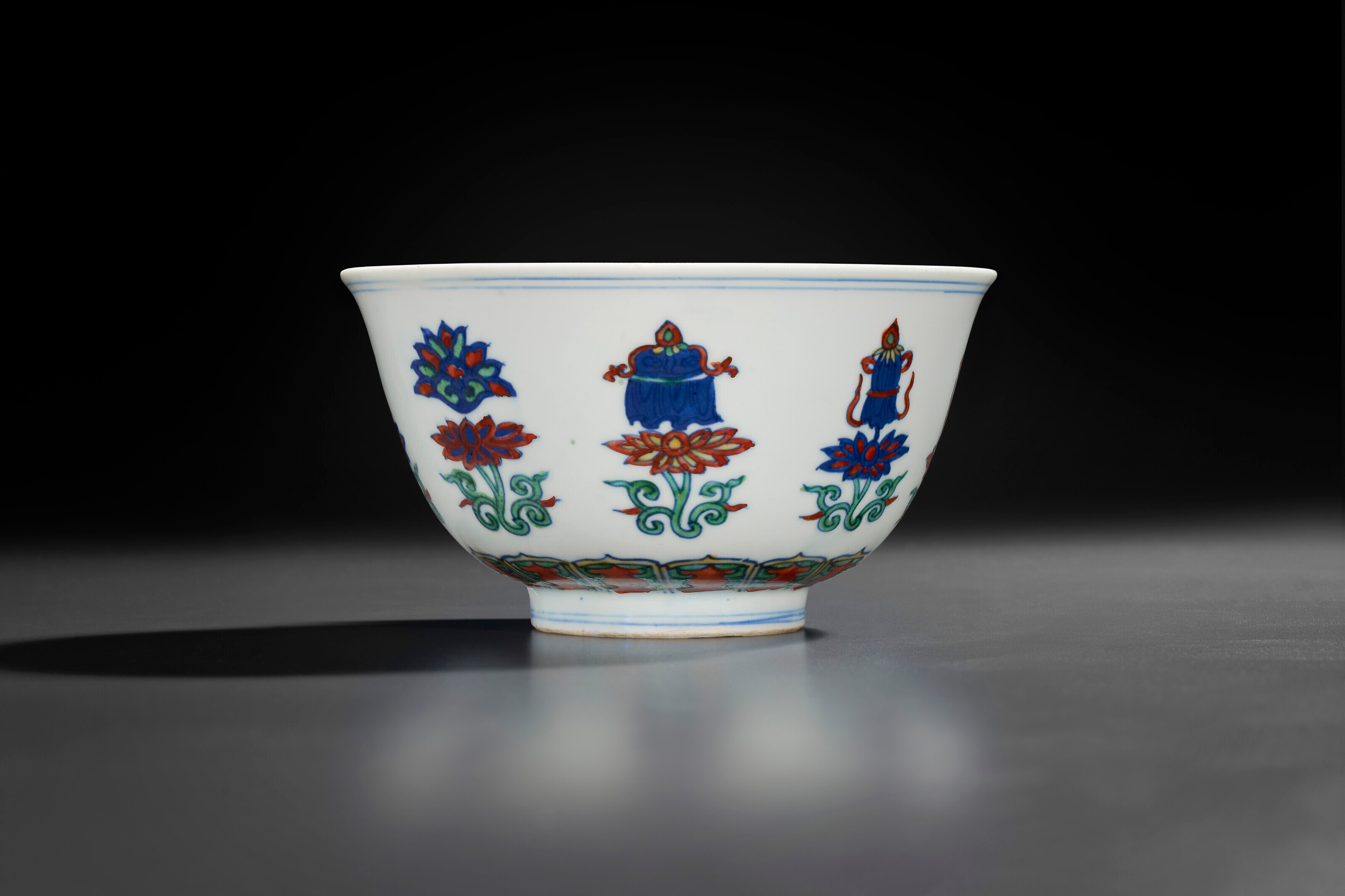 A superb and exceptionally rare doucai ‘bajixiang’ bowl, 1573-1620. 6½ in (16.5 cm) diameter. Estimate: $600,000-800,000. Offered in Marchant: Eight Treasures for the Wanli Emperor on 21 September 2023 at Christie’s in New York