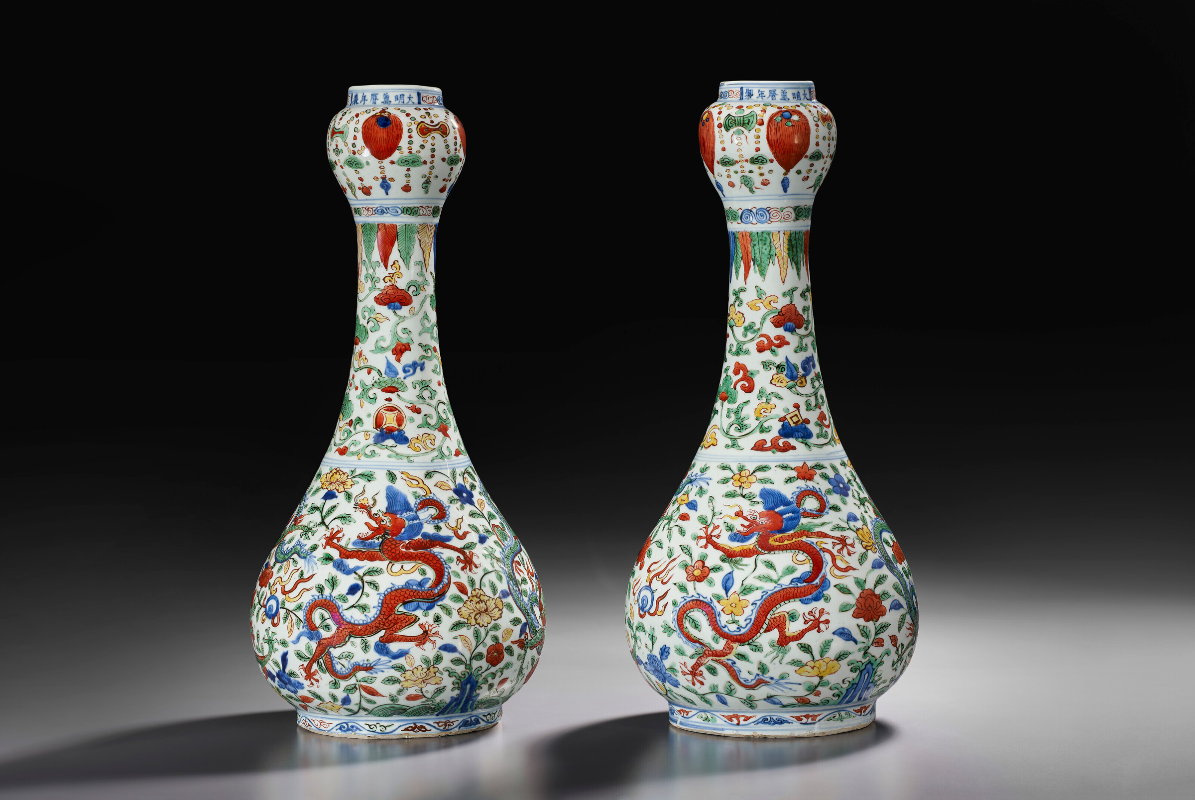 An exceptional pair of large wucai 'garlic-mouth' vases, 1573-1620. 18½ in (47 cm) high. Estimate: $600,000-800,000. Offered in Marchant: Eight Treasures for the Wanli Emperor on 21 September 2023 at Christie’s in New York