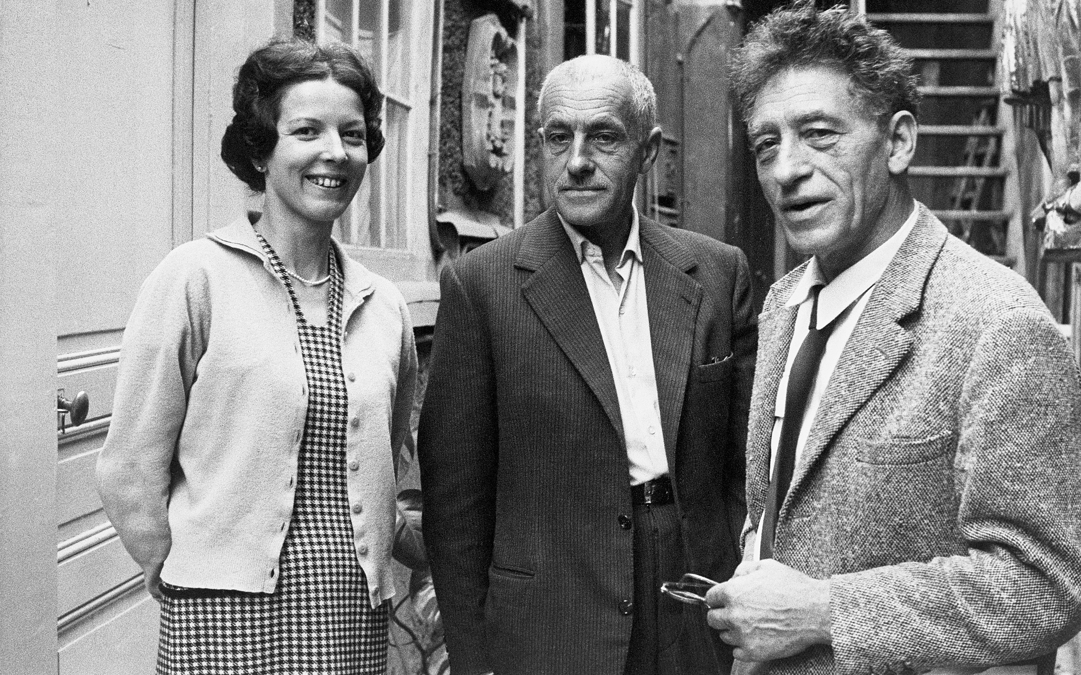 Diego (centre) with Alberto and his wife Annette Giacometti outside the brothers' studio in Paris, 1958
