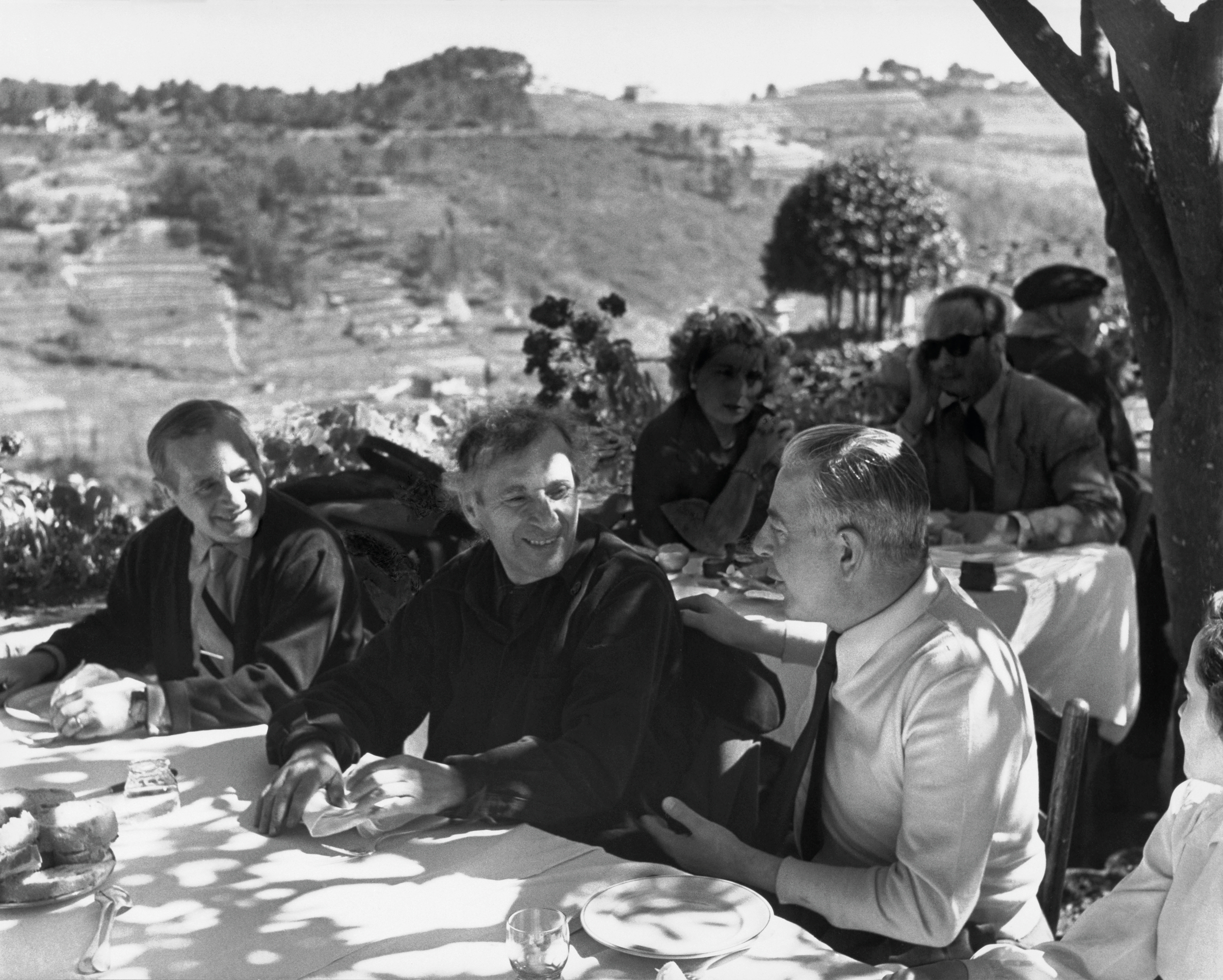 Joan Miró, Marc Chagall and Jacques Prévert on the restaurant terrace at La Colombe d’Or, circa 1950