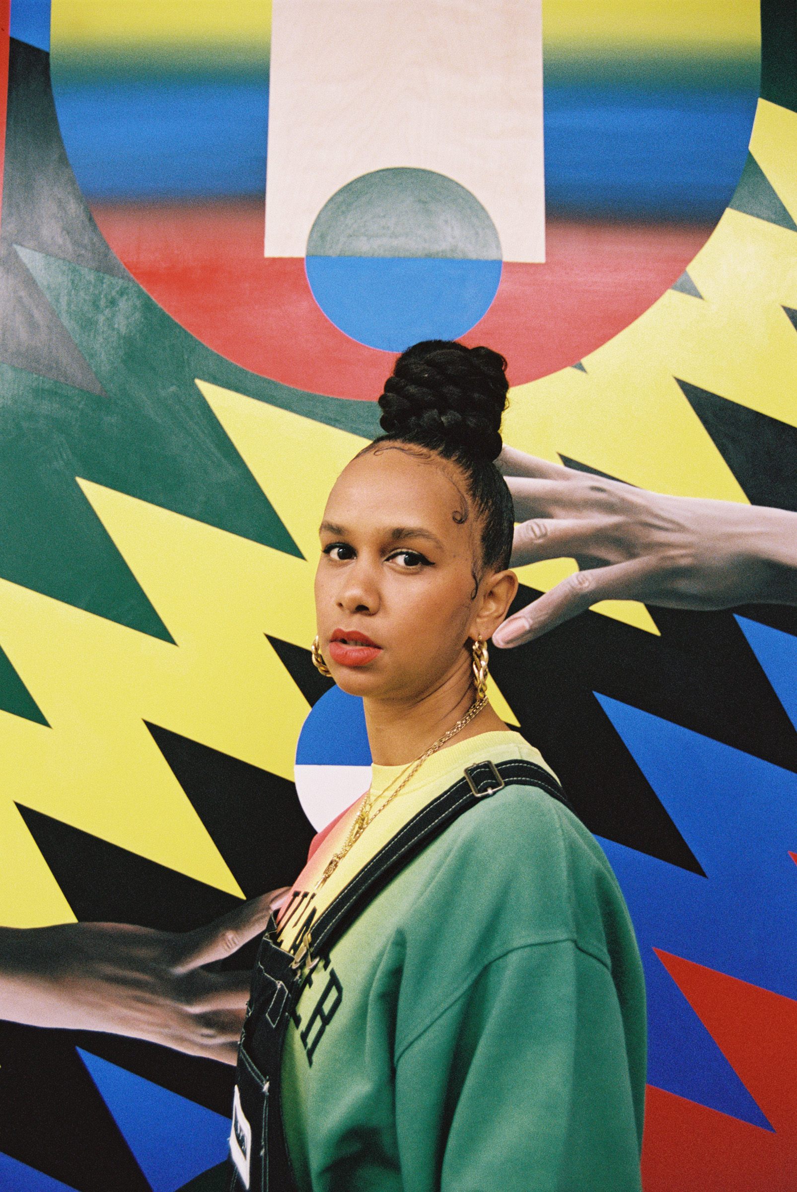 Lakwena Maciver with a work from her 2022 series Jump Paintings