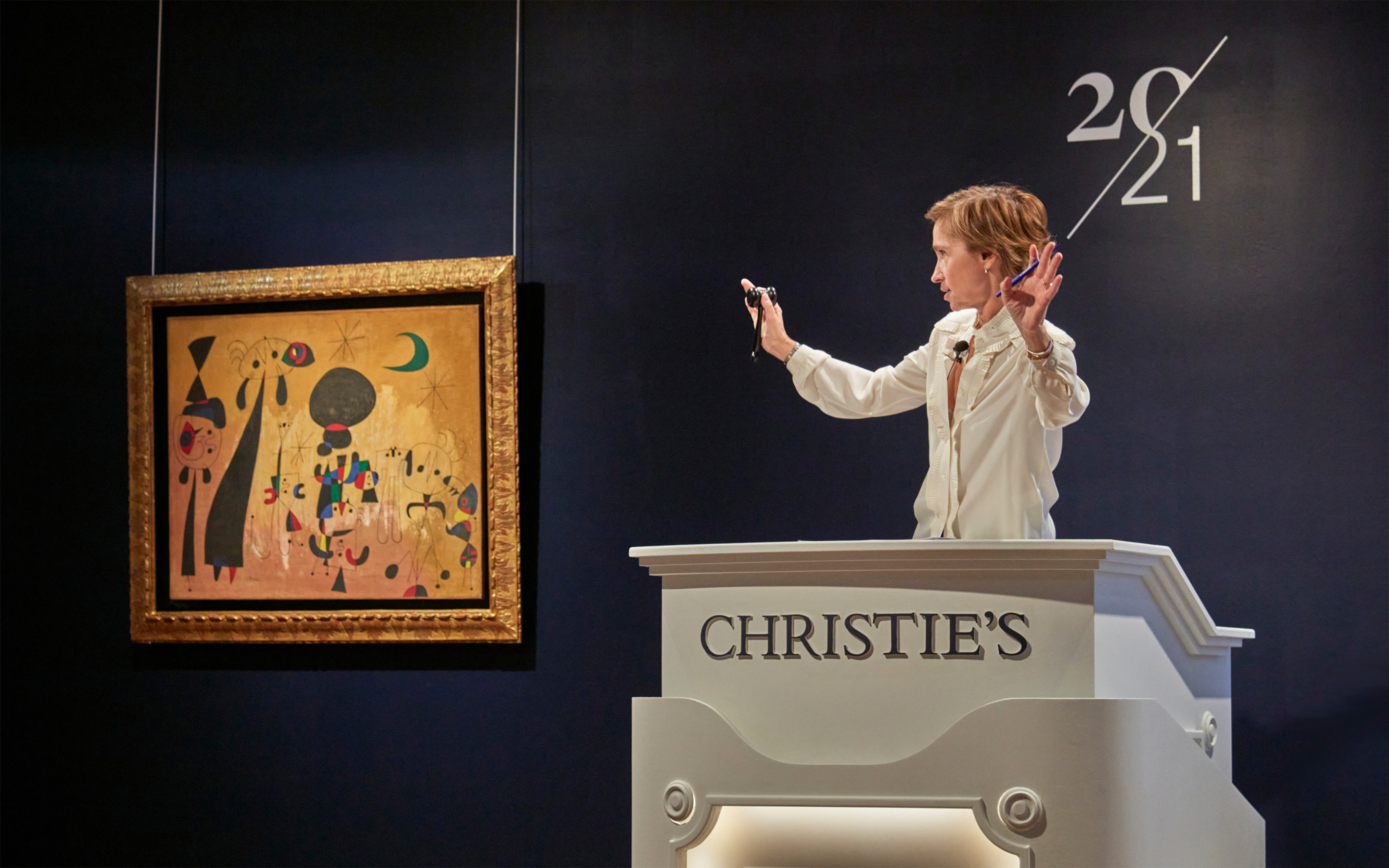 Cecile Verdier, President of Christie's France, selling Joan Miro's Peinture (femmes, lune, etoiles), 1949, which realised €20,750,000 on 20 October 2023 at Christie's in Paris