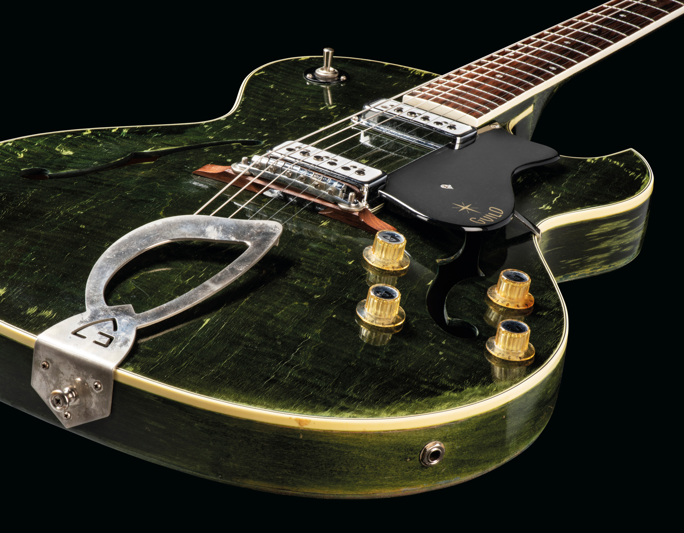 Guild Guitars Incorporated, Hoboken, New Jersey, 1961. A hollow-body electric guitar, Starfire II Emerald, offered in The Mark Knopfler Guitar Collection on 31 January 2024 at Christie's in London