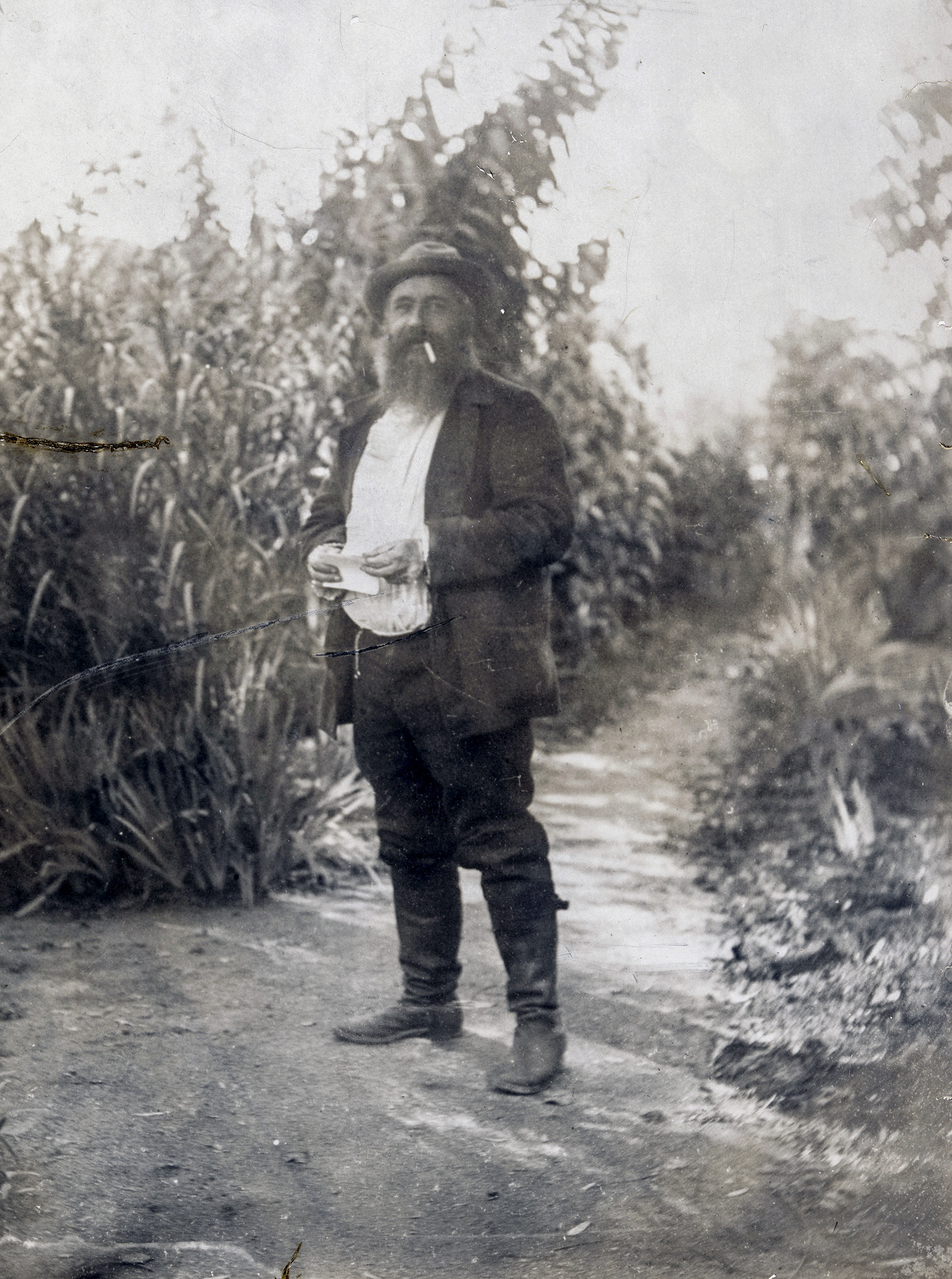 Claude Monet in his garden at Giverny around 1890-95, photographed by the American artist Lilla Cabot Perry