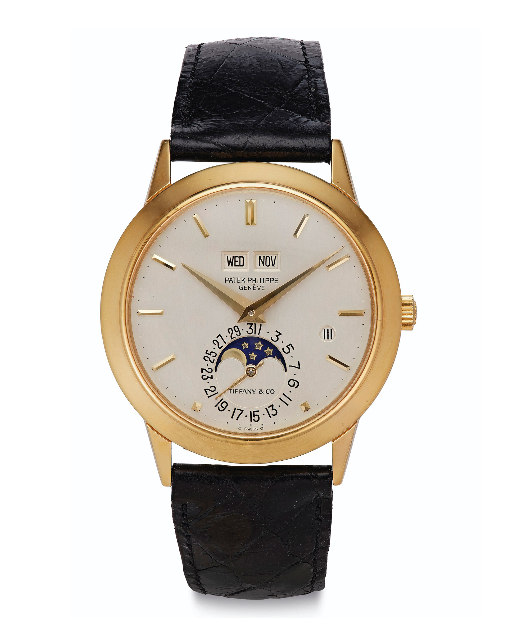 Patek Philippe. An 18k gold automatic perpetual calendar wristwatch with moon phases and leap-year indication, ref. 3450, 1983, retailed by Tiffany & Co., sold for $350,000 on 12 December 2019 at Christie's in New York