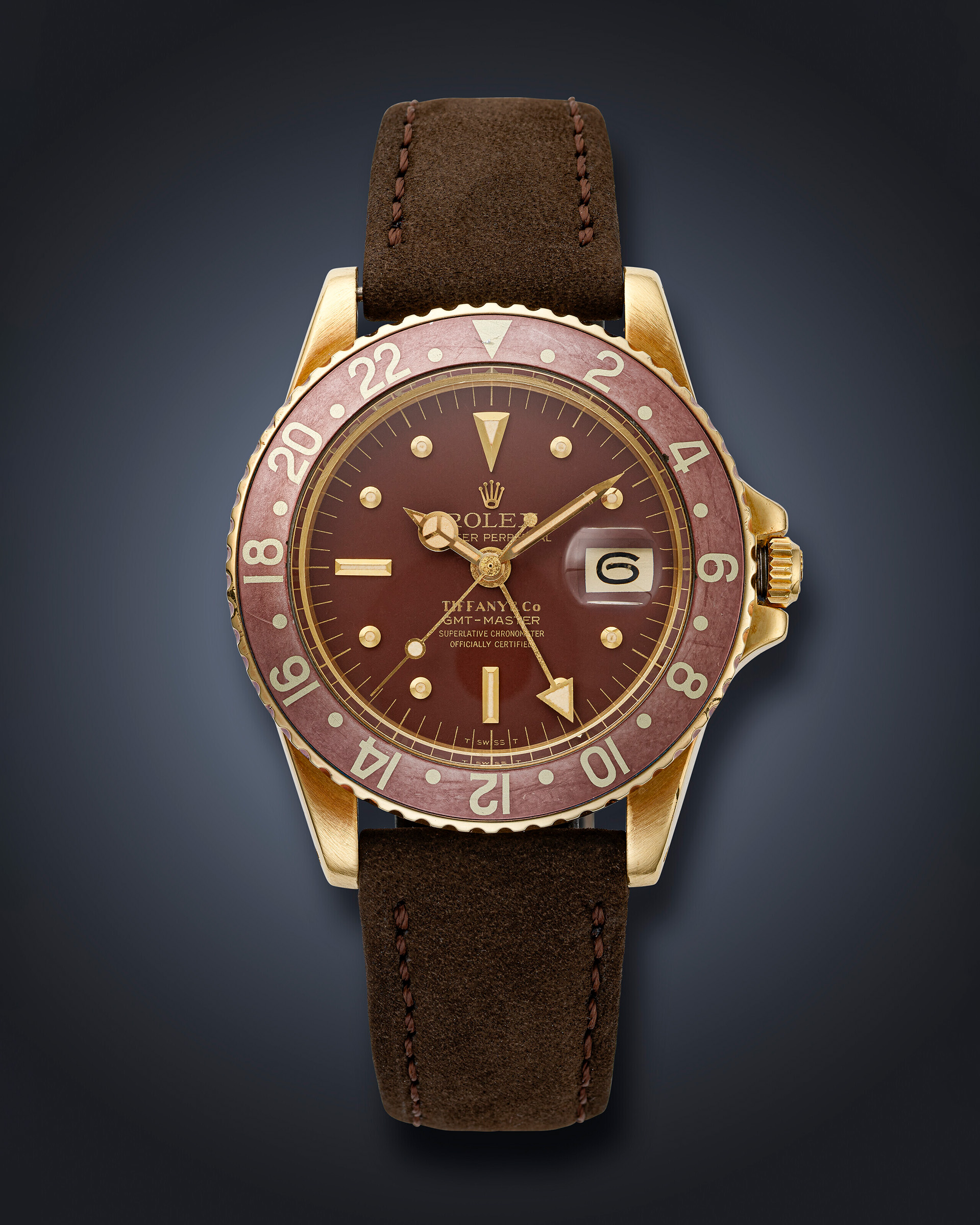 Rolex. A yellow gold dual-time GMT-Master, ref. 1675, circa 1979, retailed by Tiffany & Co., sold for CHF40,320 on 21 November 2023 at Christie's Online