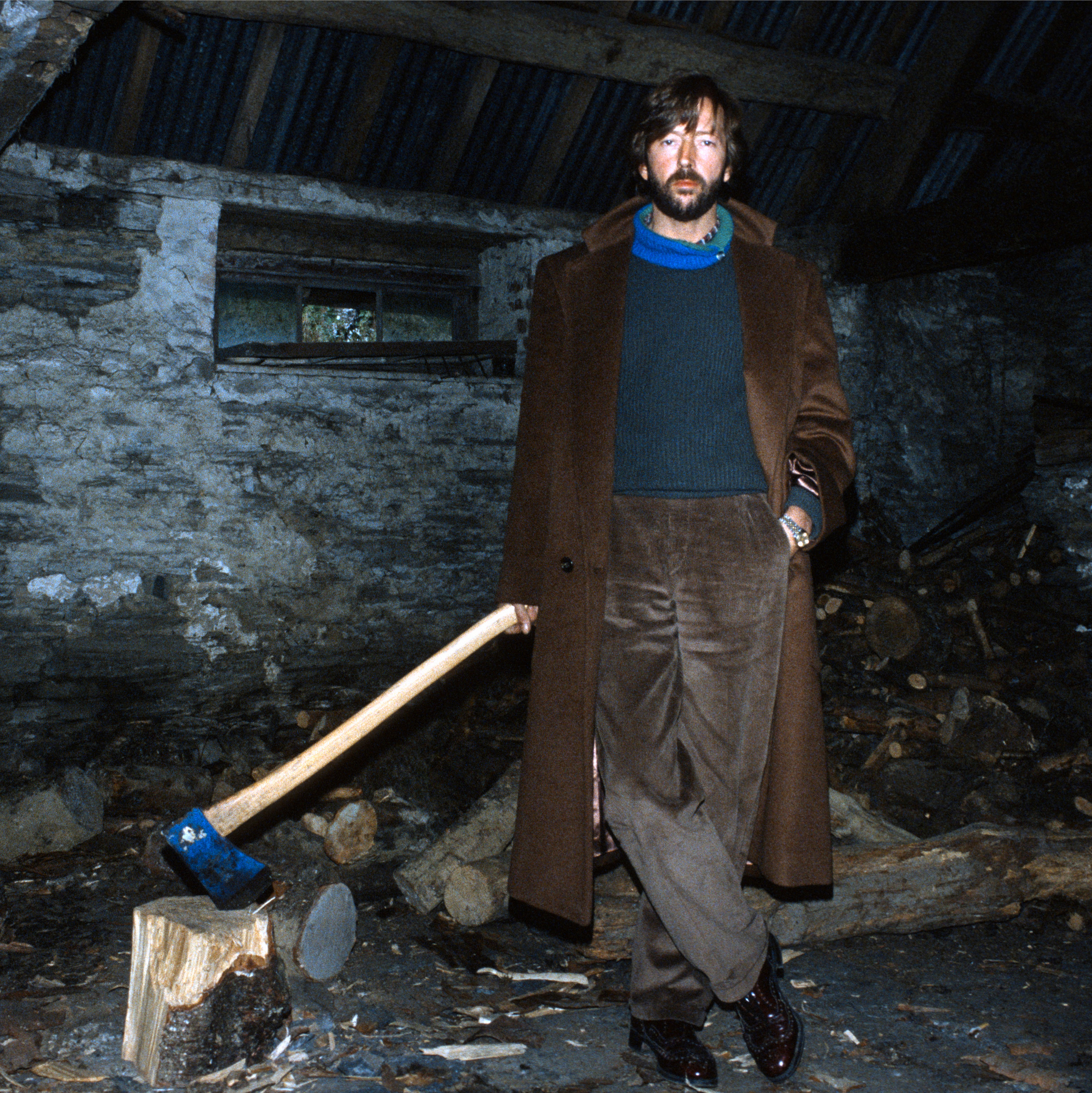 Pattie Boyd, Eric Clapton with Axe, Wales, 1984, offered in The Pattie Boyd Collection, 8-22 March 2024 at Christie's Online