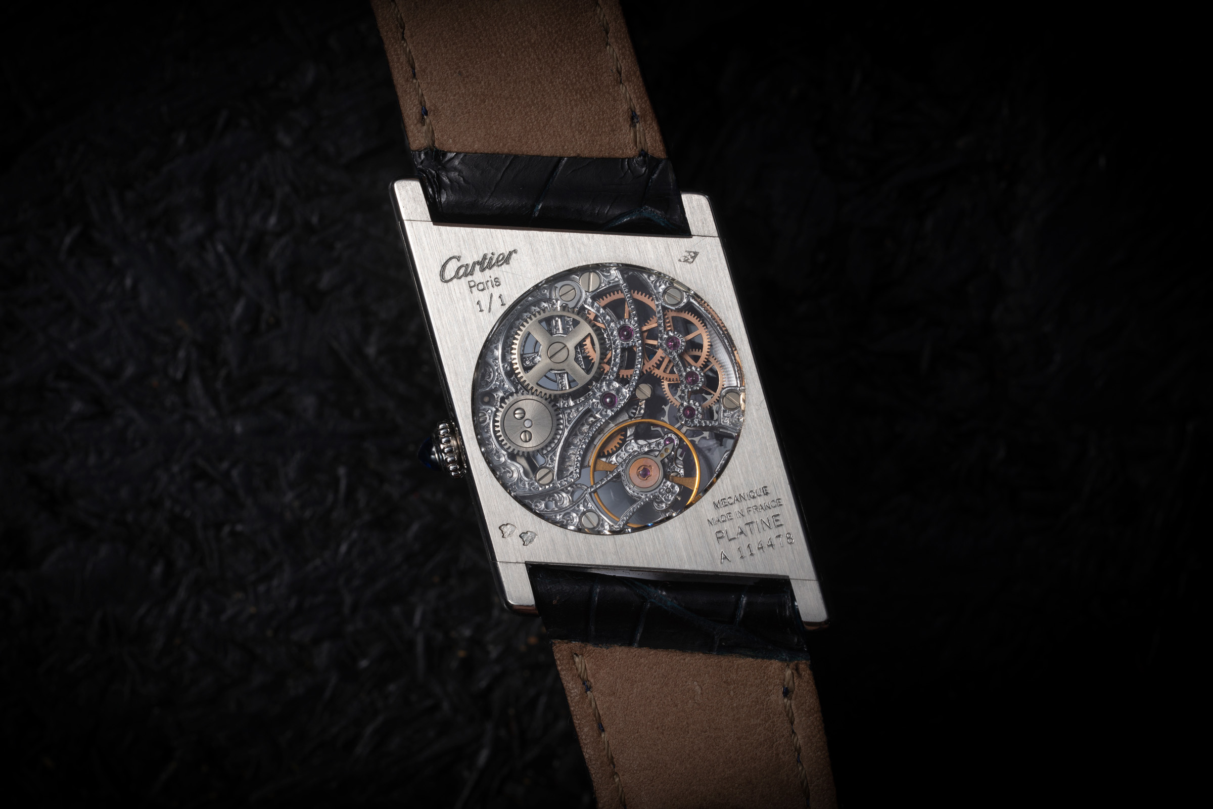 The reverse of the Cartier Asymetrique, which is inscribed 1/1, has been fitted with a crystal, allowing light to pass right through its body