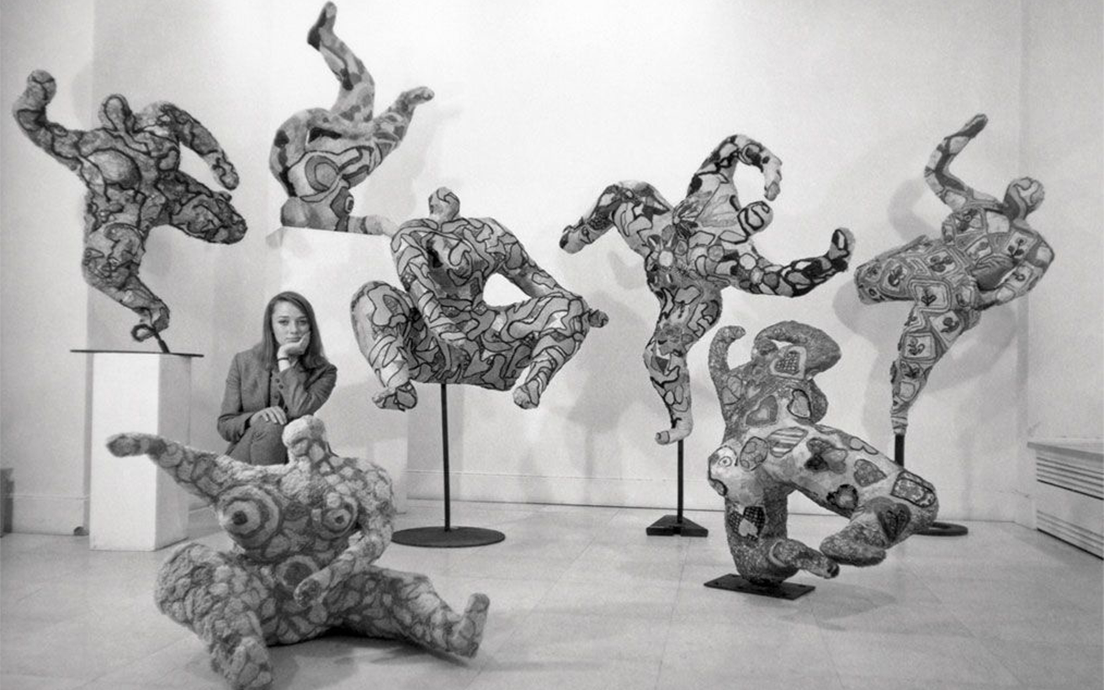 Niki de Saint Phalle posing with her Nanas at Galerie Alexandre Iolas, Paris, 1965